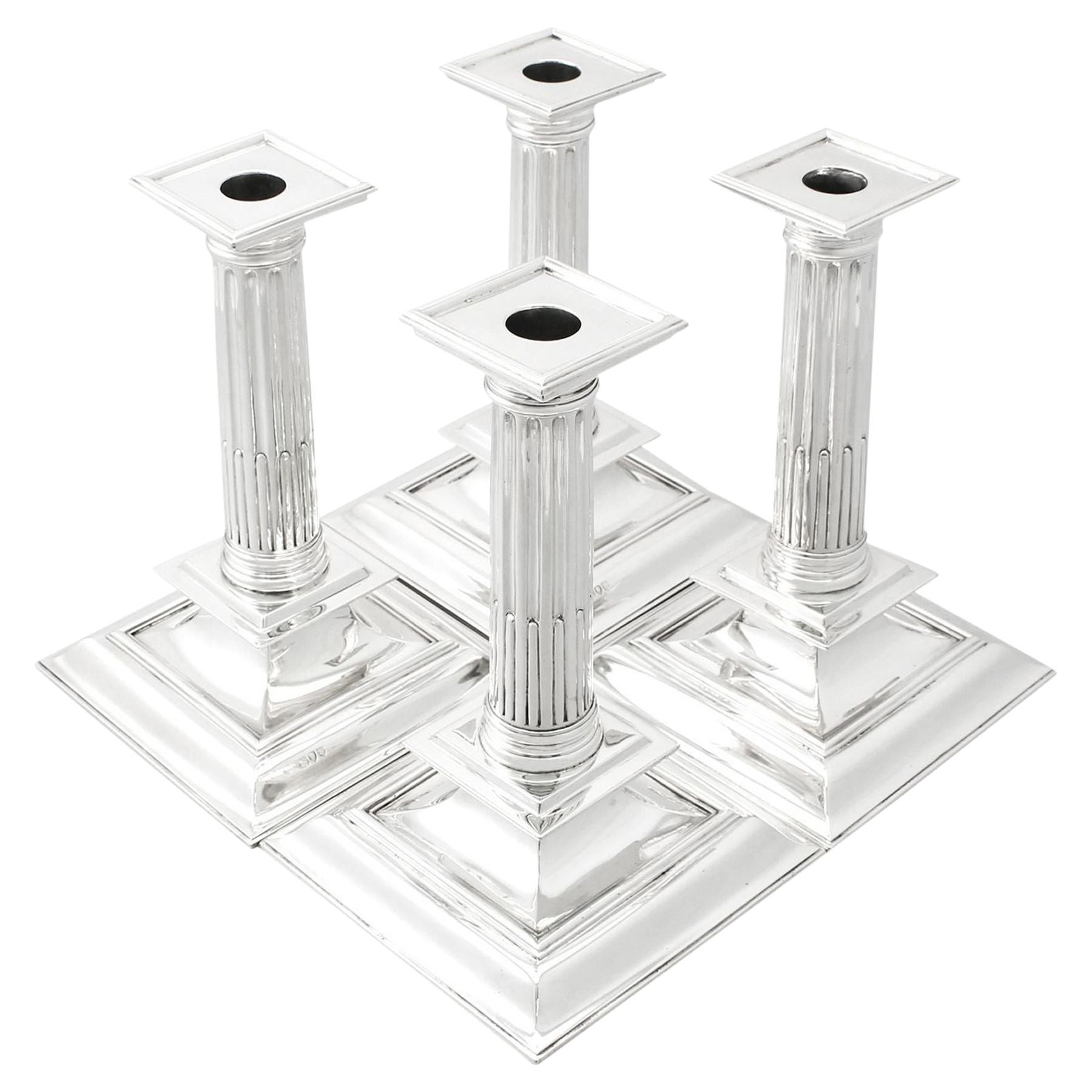 Victorian Set of Four Sterling Silver Candlesticks For Sale
