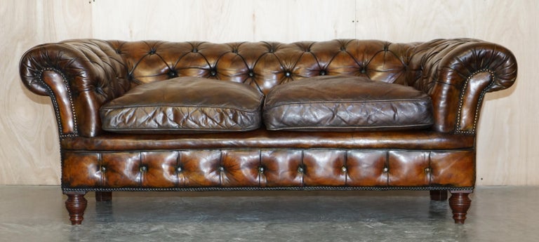 We are delighted to offer this stunning fully restored Victorian hand dyed cigar brown leather Chesterfield tufted club sofa with feather filled cushions

This sofa is as rare as they come, it’s a period original Victorian which is rare in itself