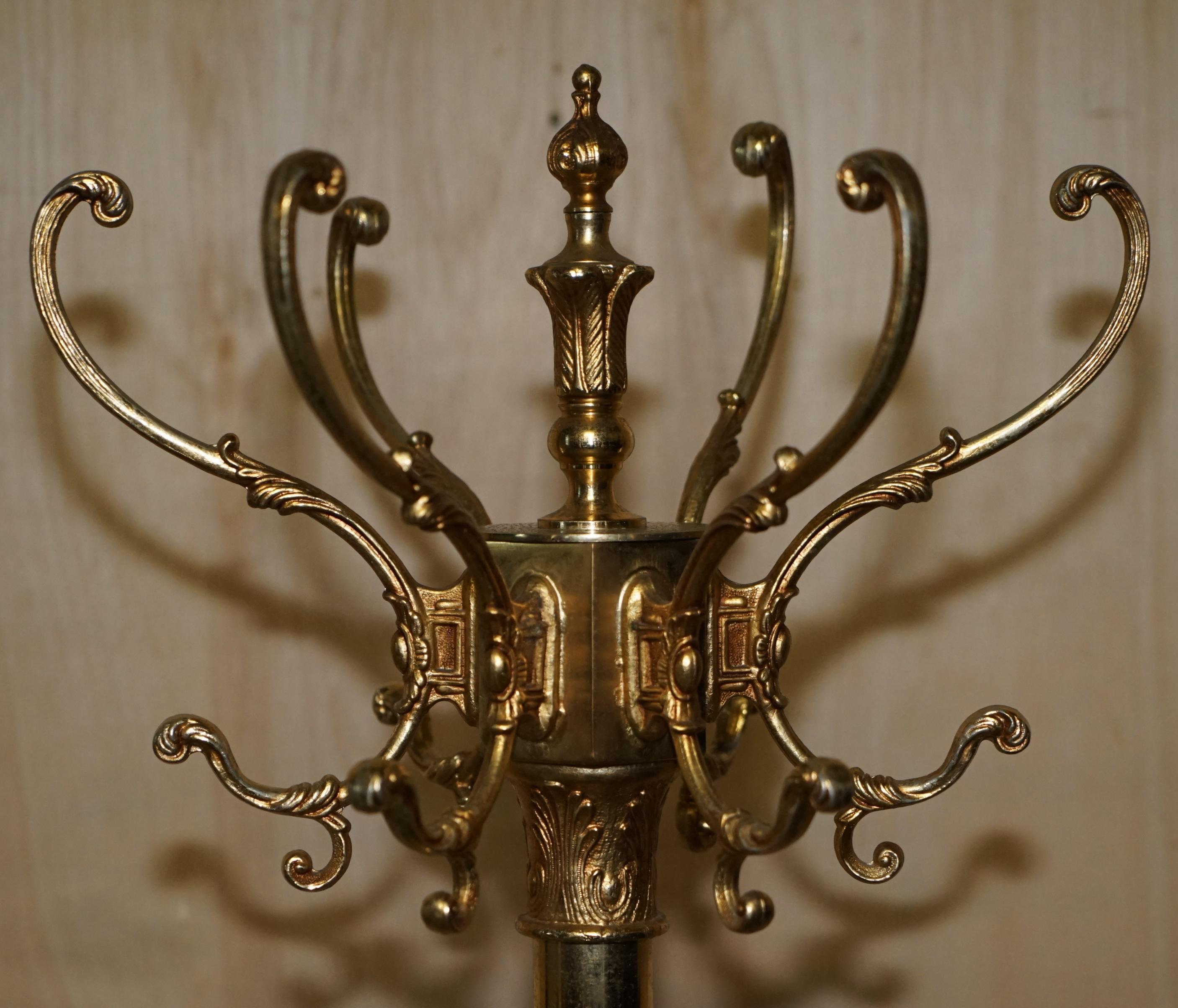 We are delighted to offer for sale this stunning original English circa 1880 brass hat glove and coat stand with rare Dolphin tripod base.

This is a bit of a unicorn in the world of coat stands, it’s a very classically English style, I've not