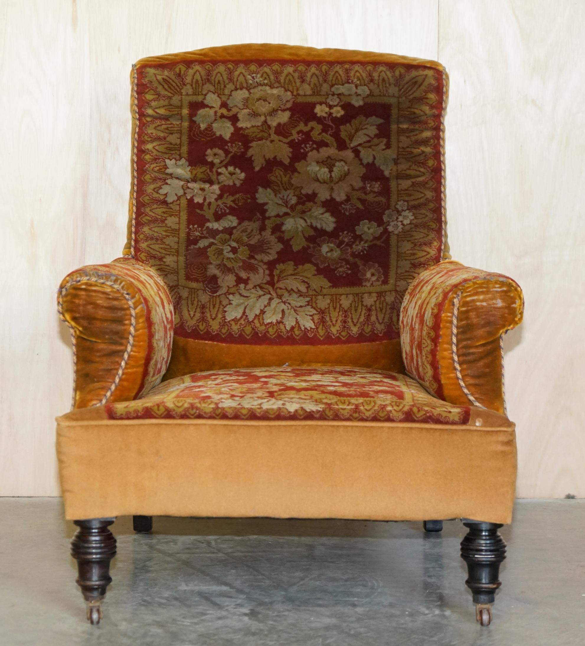 We are delighted to offer for sale this very rare and highly collectable original Victorian mahogany framed country house club armchair with bordered Turkey Kilim Rug upholstery and porcelain castors in the manner of Howard & Son's 

This armchair
