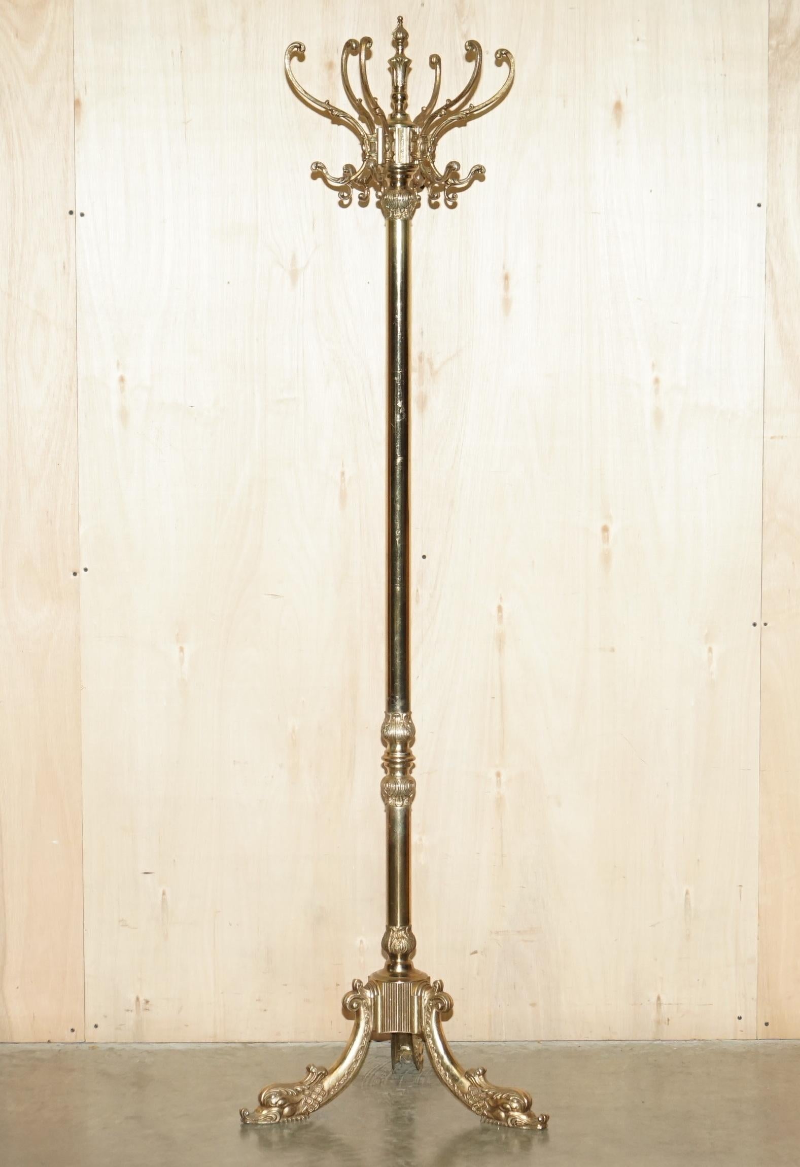 Royal House Antiques

Royal House Antiques is delighted to offer for sale this stunning original English circa 1880-1900 brass hat glove and coat stand with rare Dolphin tripod base

Please note the delivery fee listed is just a guide, it covers