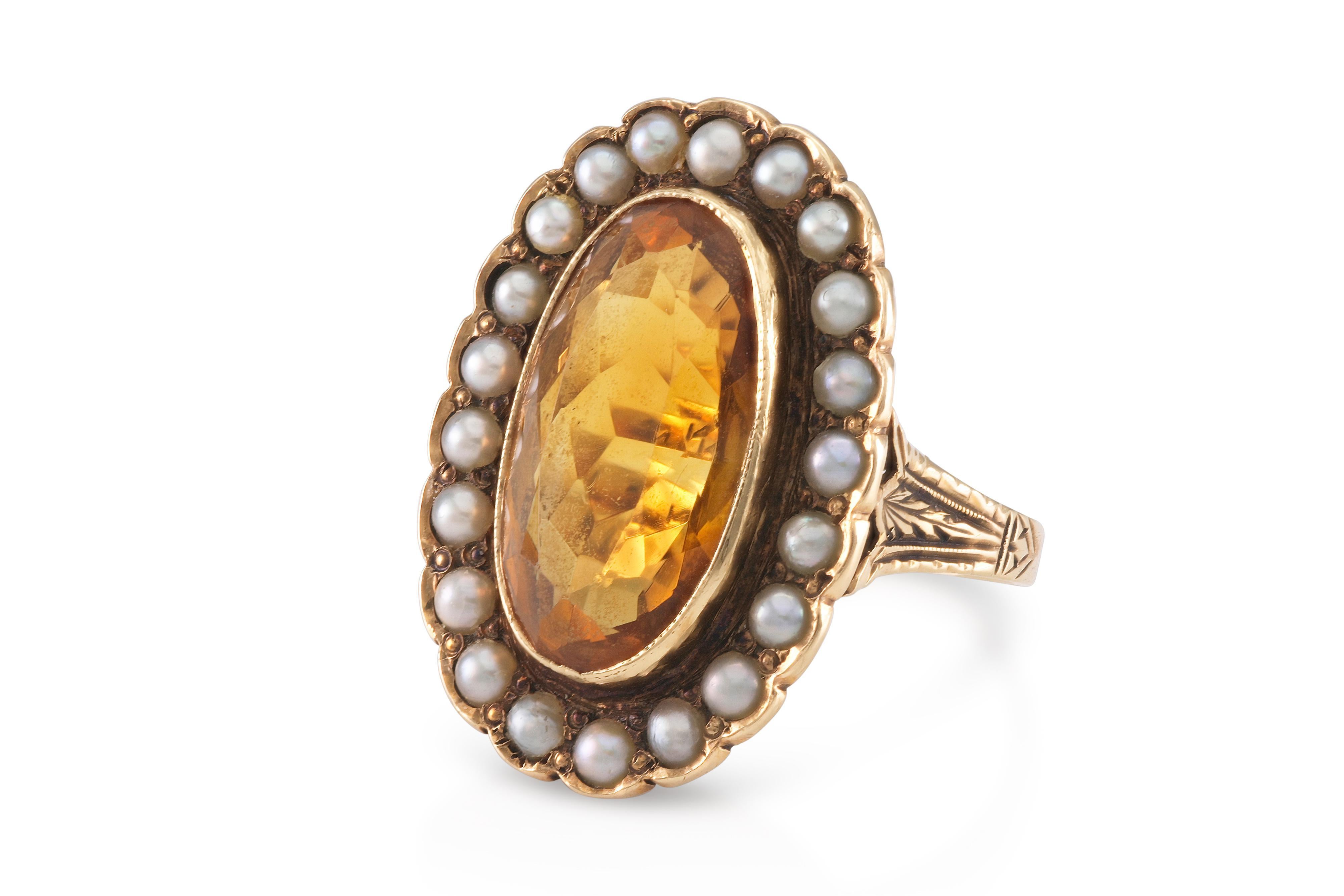 Finement réalisé en or jaune 14k avec une Citrine au centre et un halo de perles de rocaille.
Fin des années 1800.
Taille 4 1/2, redimensionnable