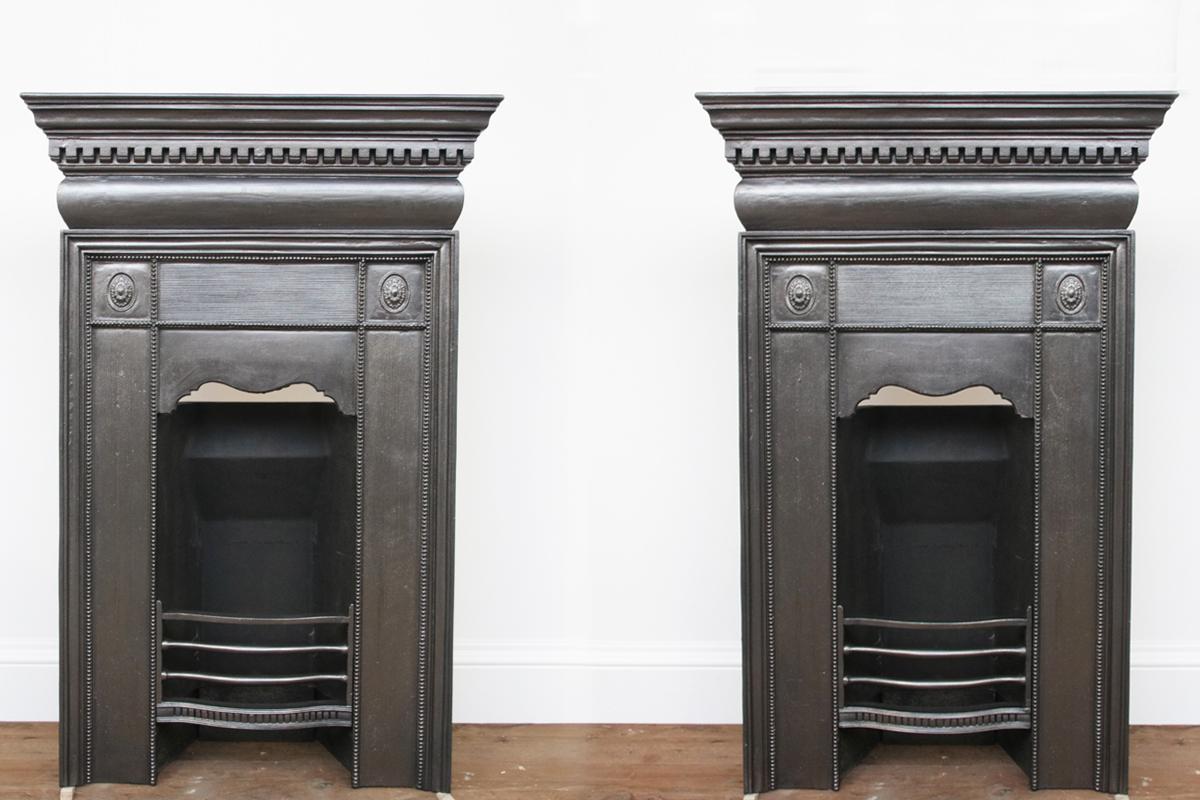 Antique Victorian classical cast iron bedroom fireplace in the Georgian style produced by Thomas Elsley Ltd, London, circa 1895

We currently have a pair of these fireplaces available. Priced individually. Supplied with a replacement clay fireback