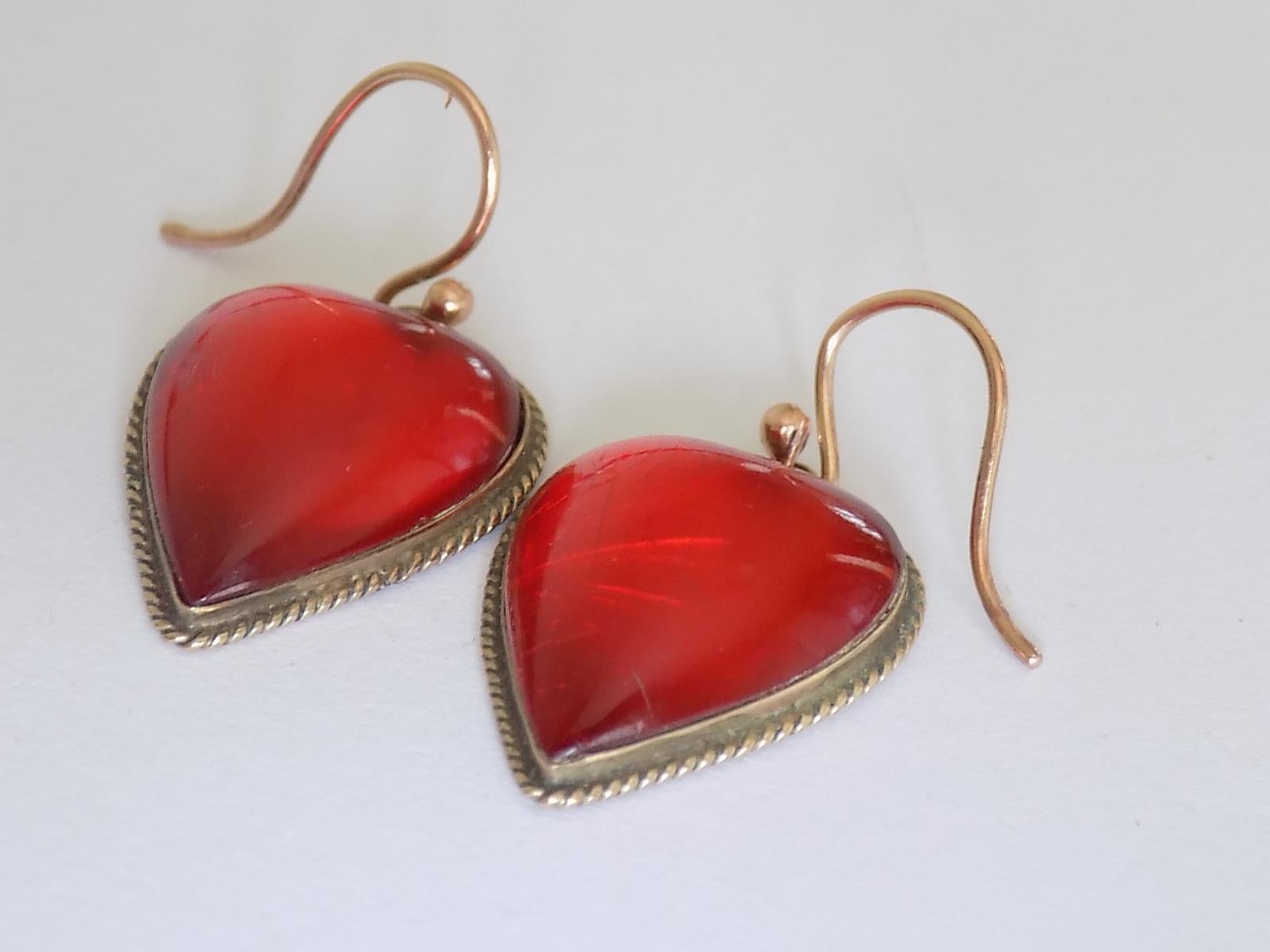 selena heart earrings