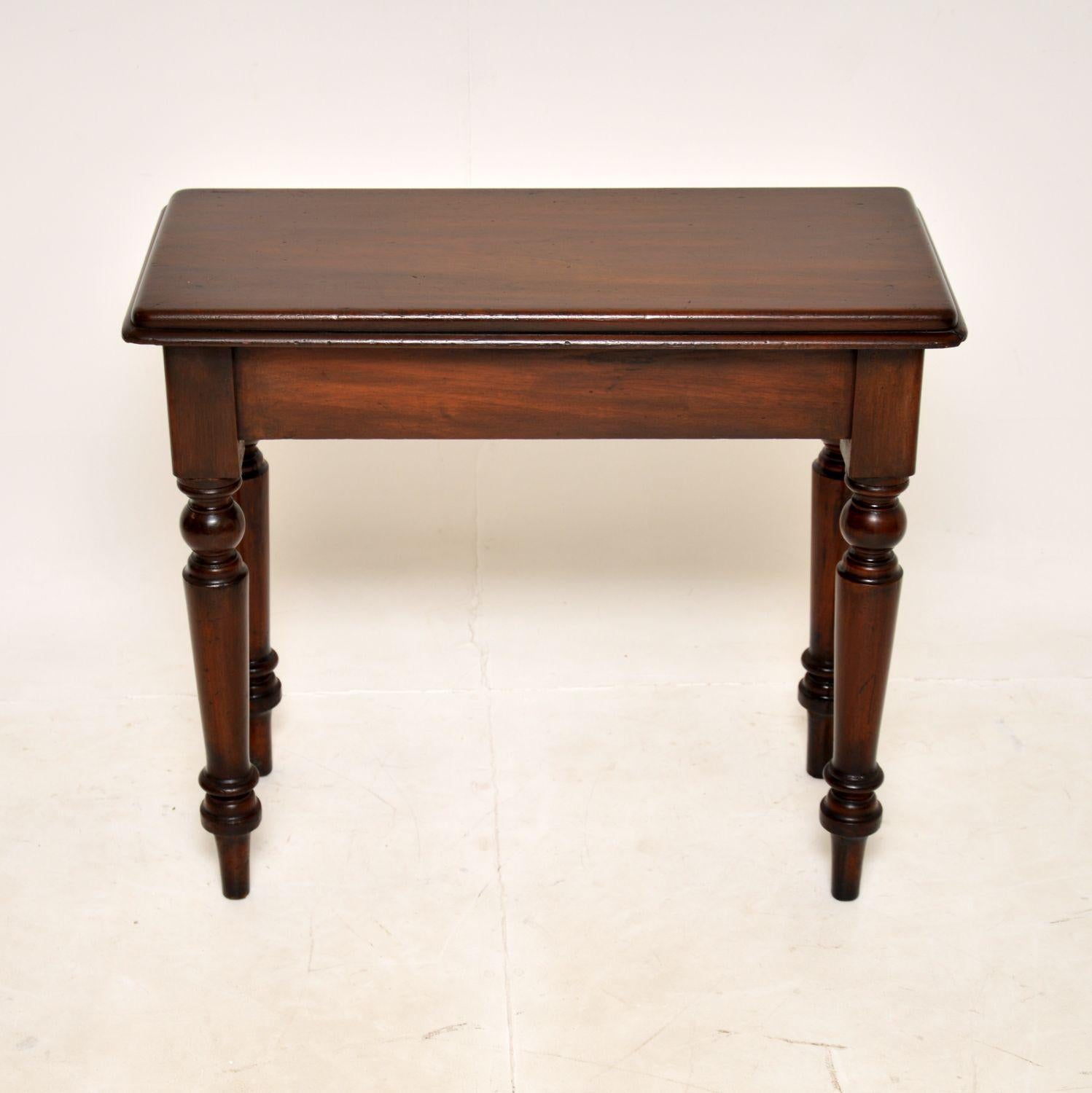 A very well made antique Victorian side table. This was made in England, it dates from the 1860-1880’s.

The quality is superb, the legs are beautifully turned and bold, the solid top has a nicely moulded edge. This is finished on both sides, so can