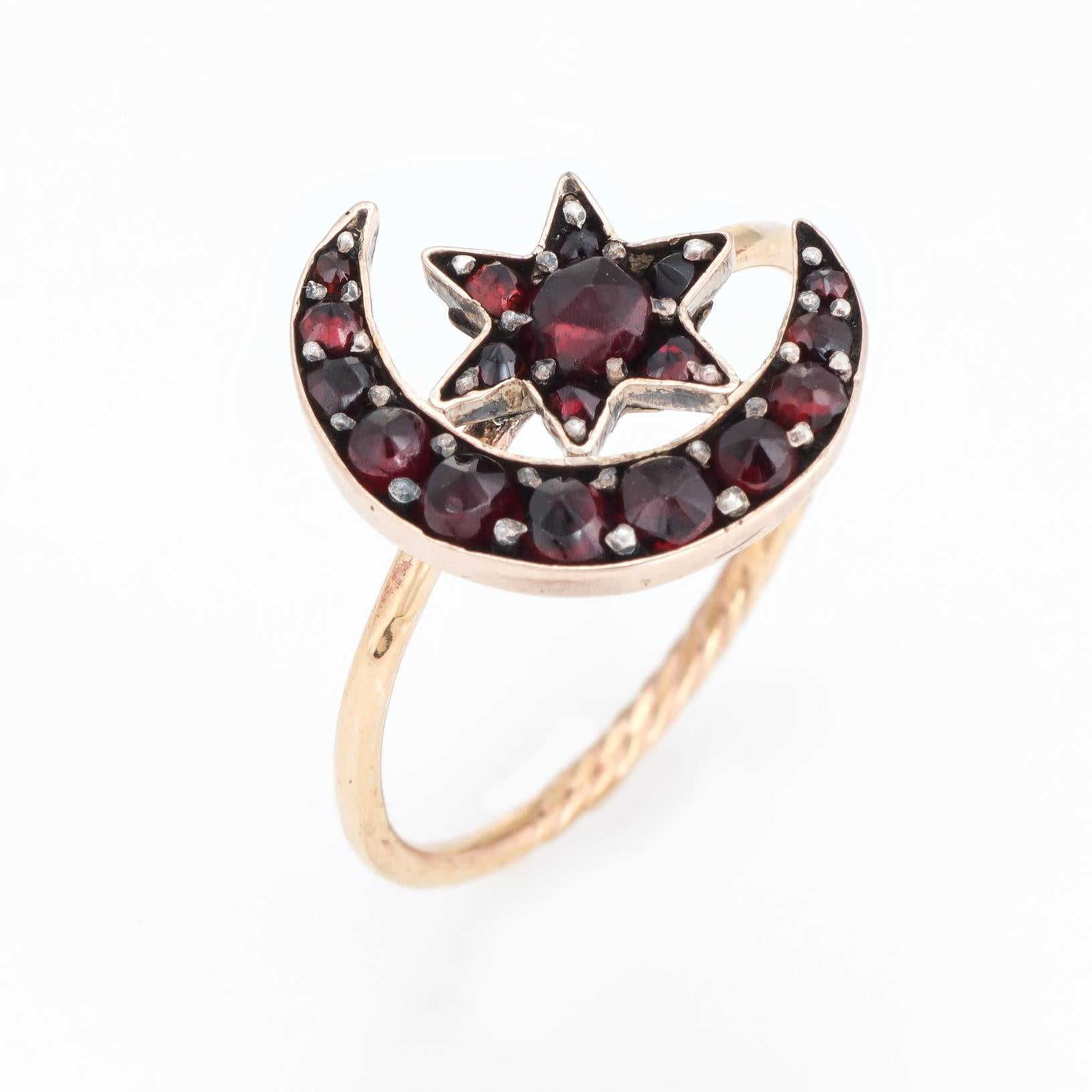 Originally an antique Victorian era stick pin (circa 1880s to 1900s), the crescent moon ring is crafted in 10 karat yellow gold. 

The ring is mounted with the original stick pin. Our jeweler rounded the stick pin into a slim band for the finger.