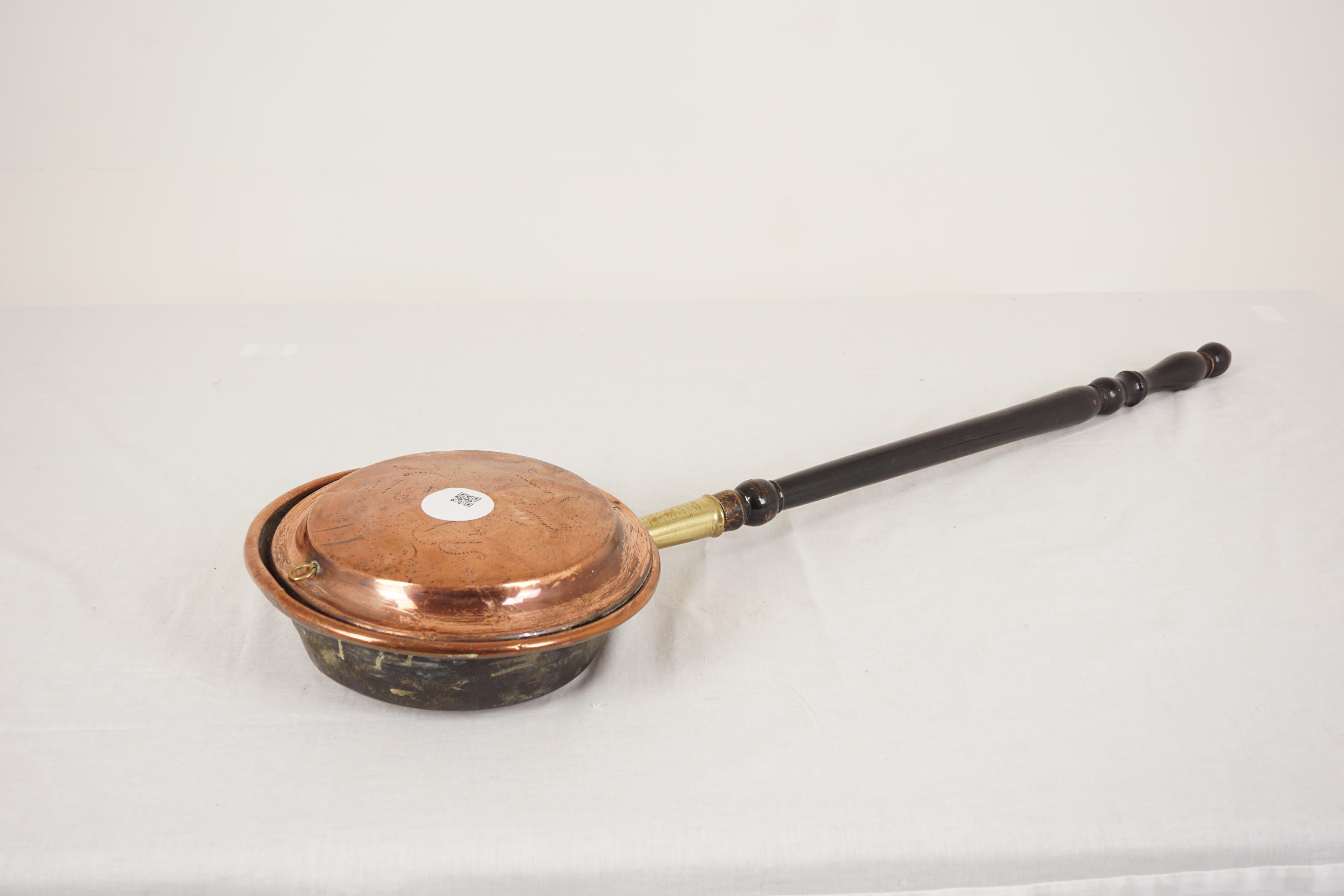 Antique victorian copper bed warmer, bed pan, Scotland 1880, H1088

Scotland 1880
Solid Copper
Original Finish
Turned wooden handle
Embossed top copper lid opens to reveal interior which will hold warms coals
These were used to warm the