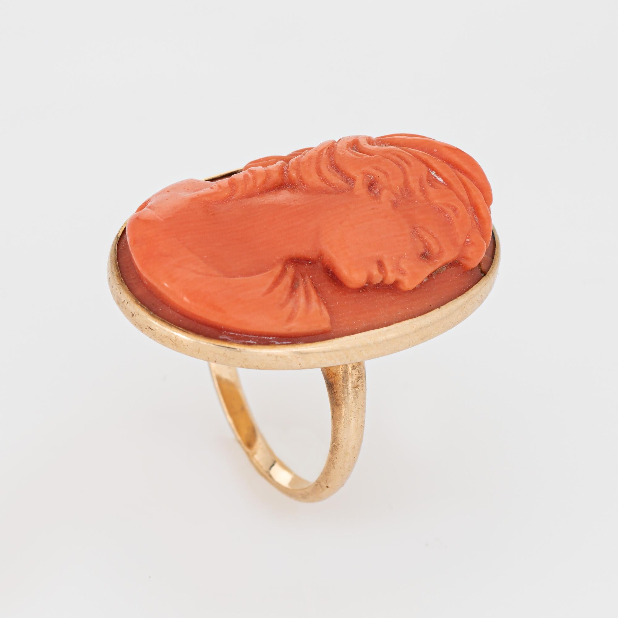 Bold and distinct antique Victorian cameo ring, crafted in 14 karat yellow gold (circa 1880s to 1900s). 

Carved coral measures 25mm x 15mm. The coral is in good condition and free of cracks or chips (few light surface abrasions from wear and age). 
