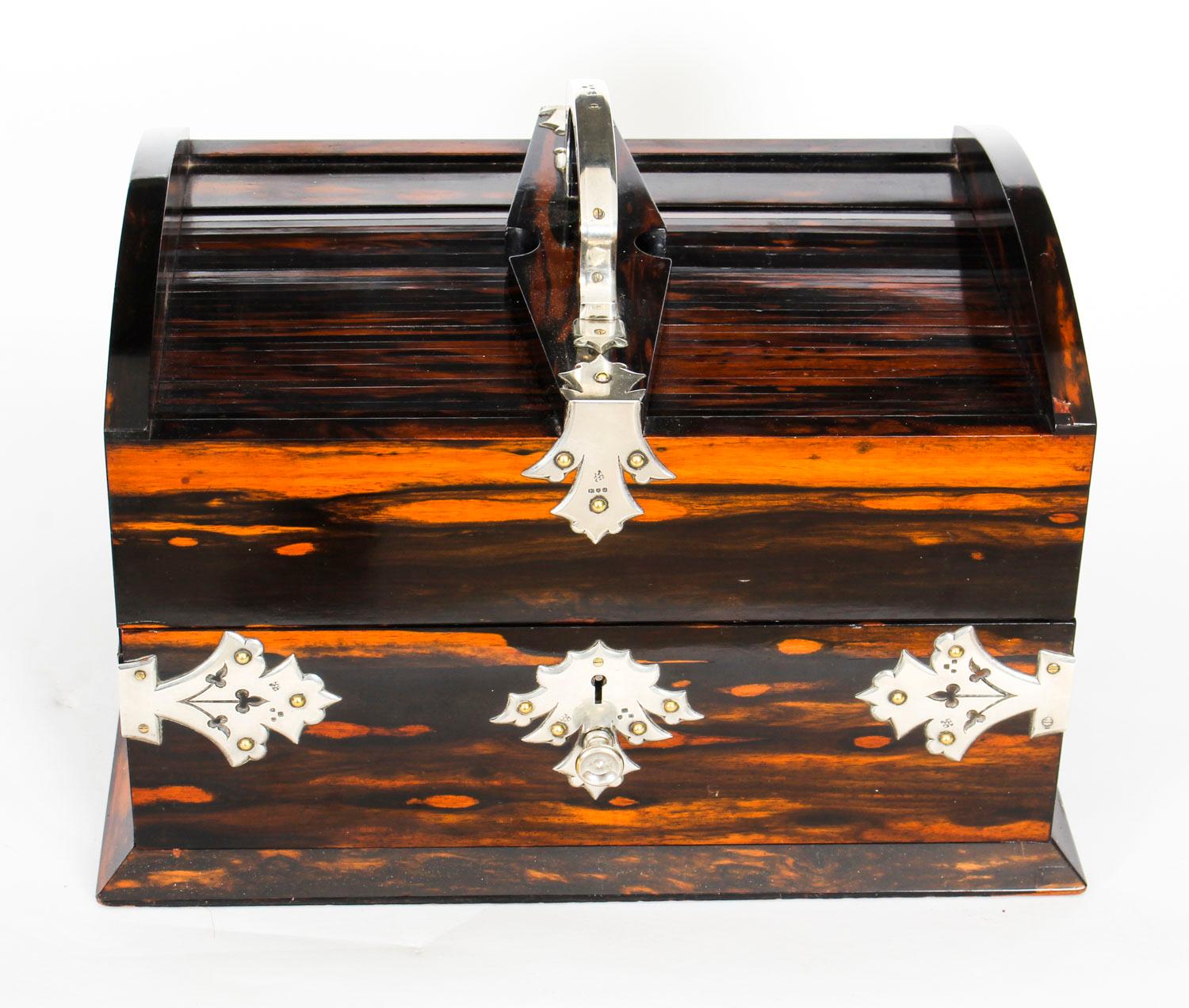 This is a magnificent antique late Victorian Coromandel and sterling silver mounted desk top cigar box, humidor, bearing hallmarks marks for London, 1899 and the makers mark GB- GWB-JB for George Betjemann & Sons. The ‘GB’ refers to George