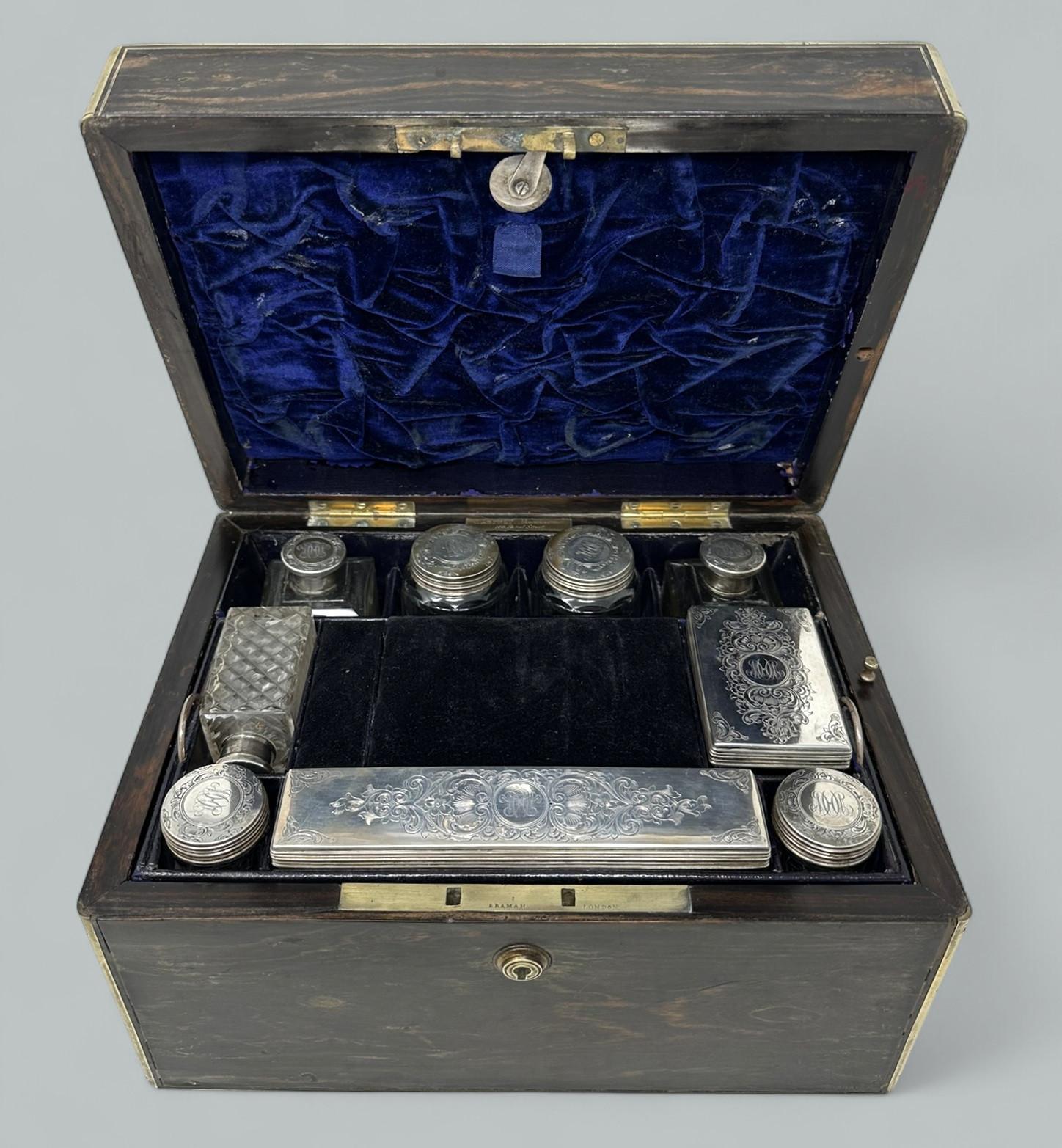 A Stunning & Rare early Victorian well figured brass mounted Coromandel Ladies or Gentleman’s Vanity Jewellery Casket of generous proportions, by World famous maker William Asprey London. Mid Nineteenth Century. 

The hinged lid opens to reveal a