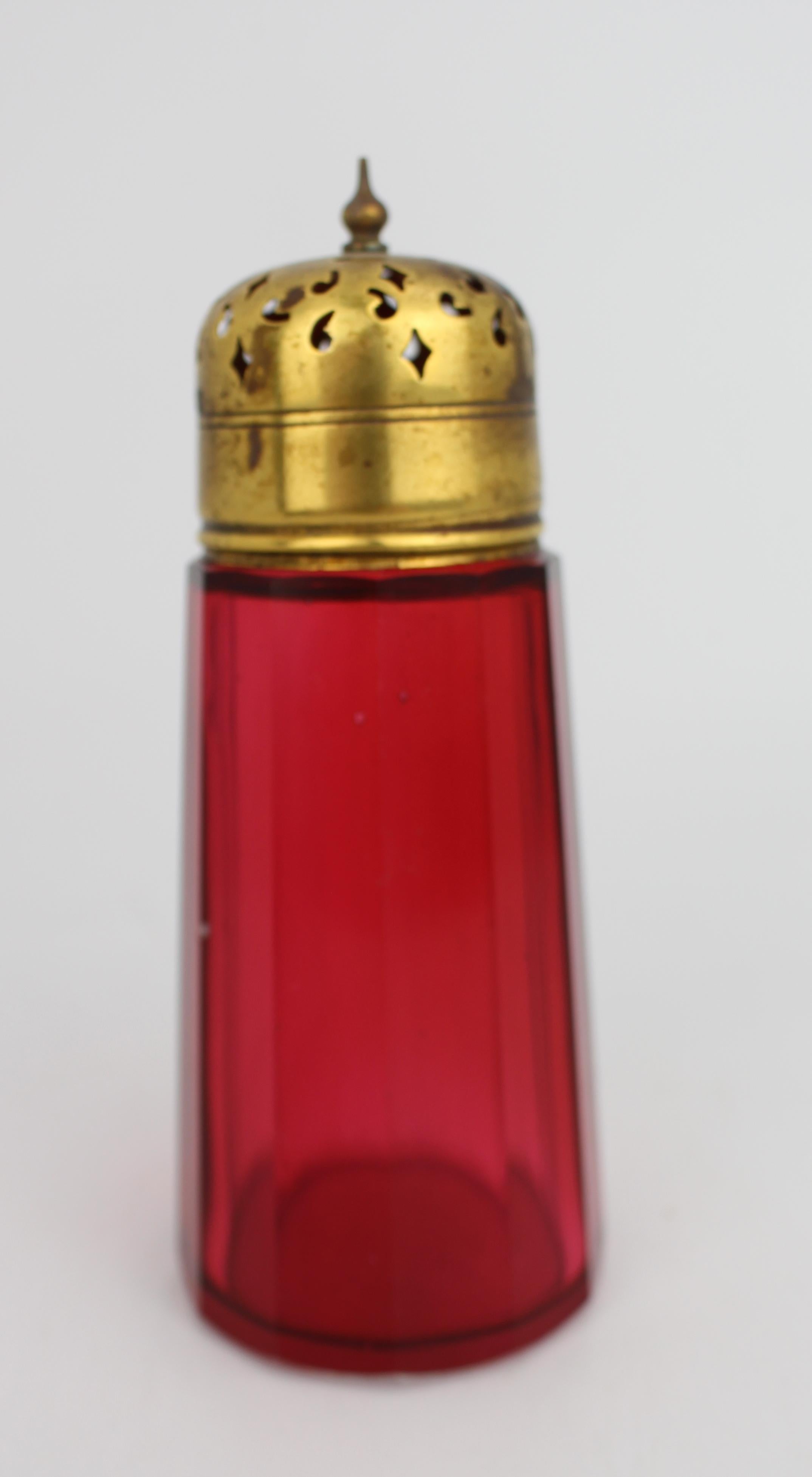 Antique Victorian Cranberry Glass Sugar Dredger

A fine quality Victorian sugar dredger. The body in rich cranberry glass with faceted sides, fitted with a pierced and domed brass lid with turned finial, screw threaded.

Measures 5.5 x 5.5 x 14.5