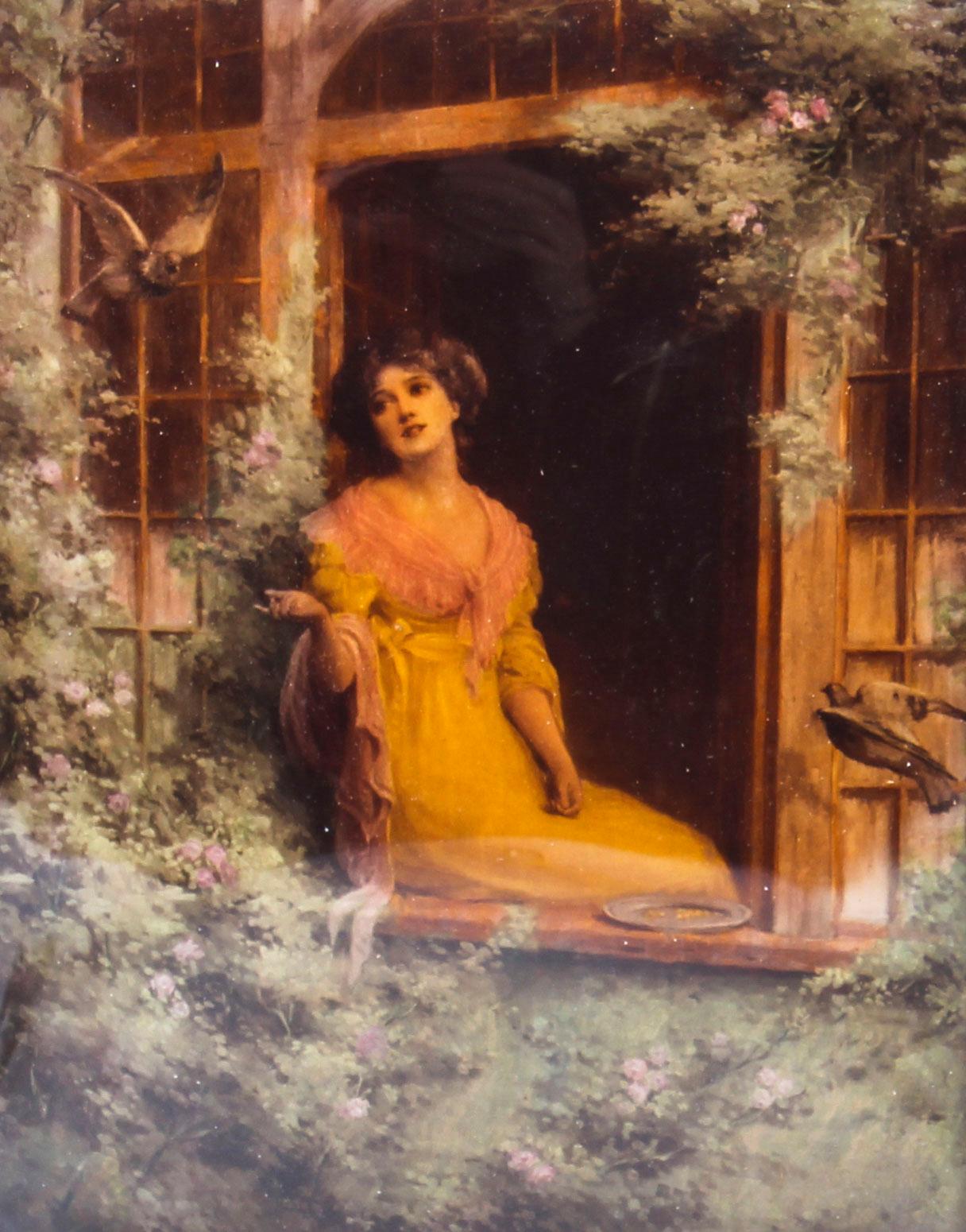 This is a charming antique Victorian crystoleum print on concave glass, circa 1890 in date.
 
It depicts a young lady dressed in Georgian period costume sitting on a window ledge of a large country house feeding birds.
 
The picture is framed in