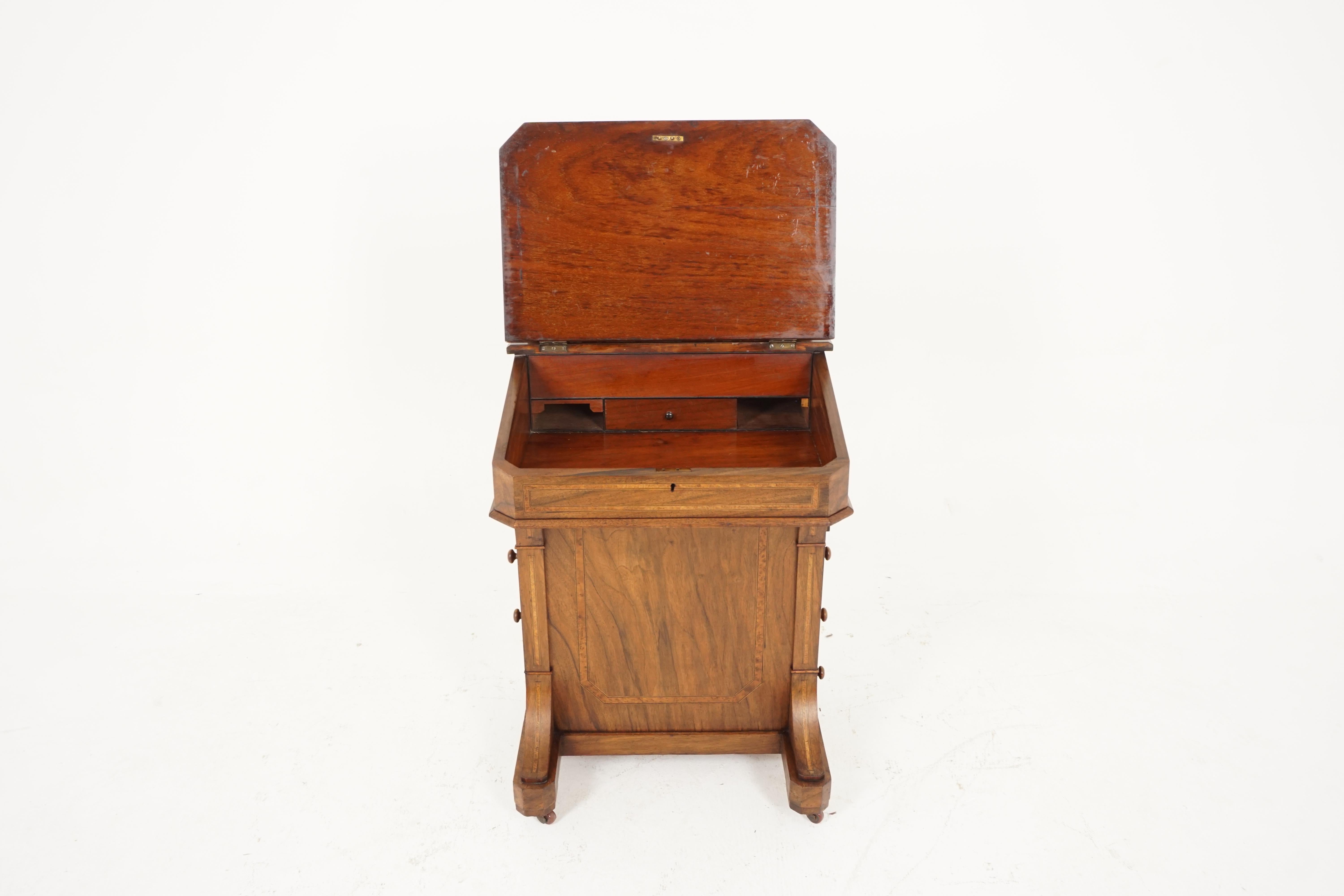 Antique Victorian Davenport desk, walnut writing desk, Scotland 1880, B2377

Scotland 1880
Sloping top with brown leather writing surface
With lifting stationary box on top with pigeon holes and pen holder
The sloping top lifts up and reveals a