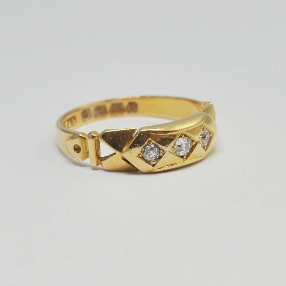 Victorian diamond and gold band ring; this classic Victorian ring would make a superb antique wedding ring;  it is set with 3 Old European Cut diamonds totalling 0.12ct, each in a lozenge shape.  Weight 3.6gms.  English hallmarked 18ct gold