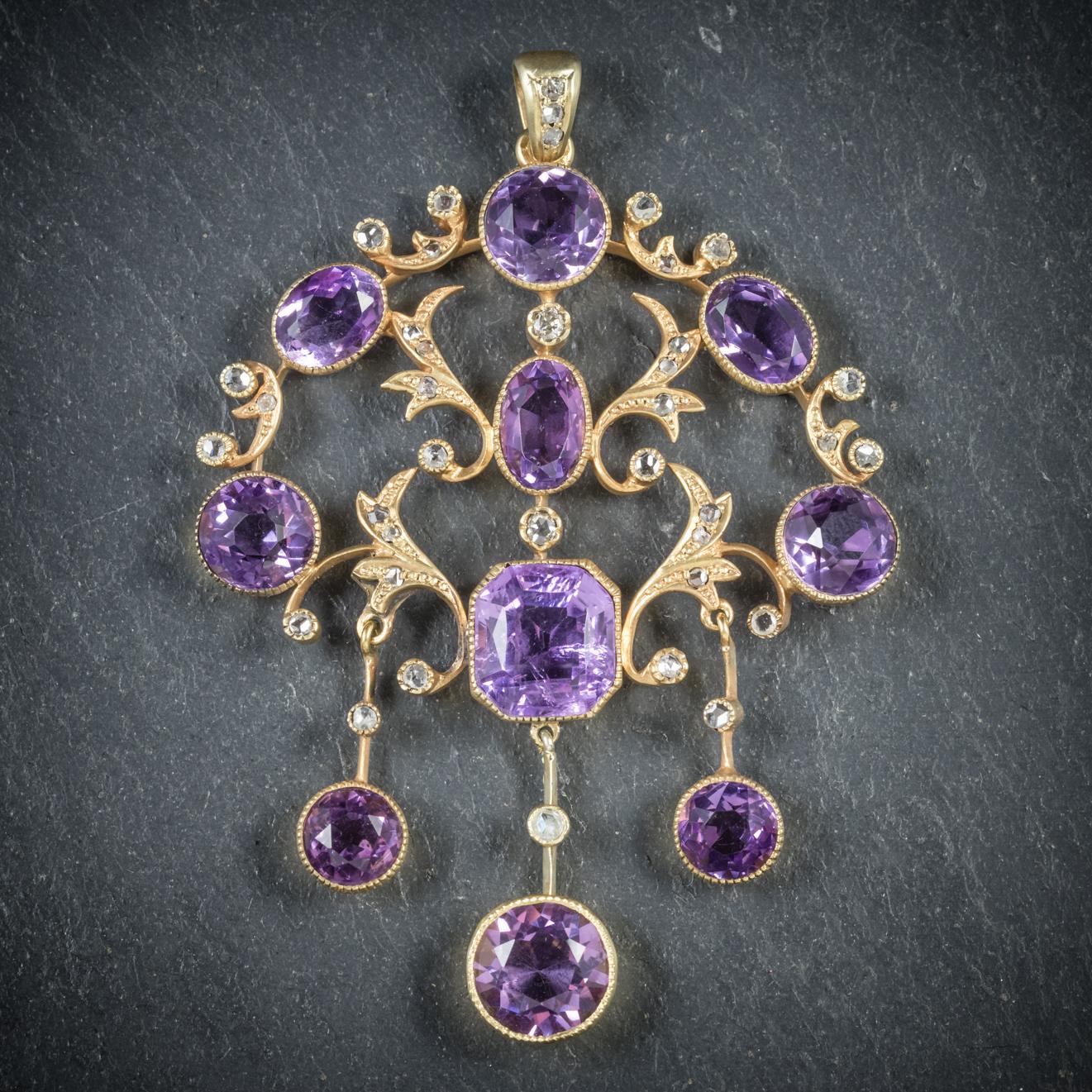 This grand antique Amethyst and Diamond Garland pendant is Victorian, Circa 1890

Ten rich purple Amethyst decorate the piece with sparkling Rose Cut Diamonds nestled in between

There are over 15ct of Amethyst in total with three fabulous Amethyst