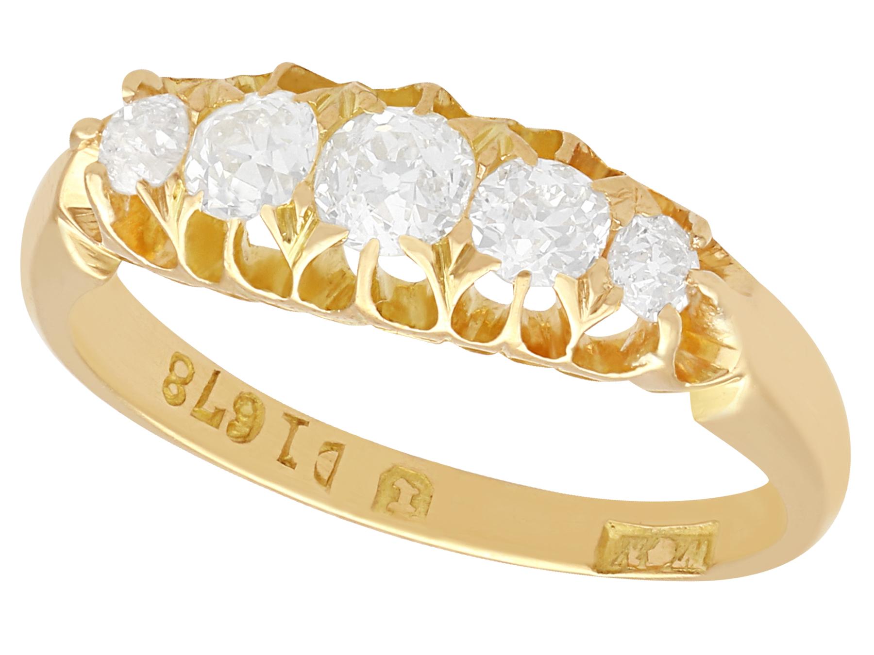 A fine and impressive 0.67 carat diamond and 18 karat yellow gold five stone dress ring; part of our diverse antique jewelry and estate jewelry collections.

This fine and impressive Victorian diamond ring has been crafted in 18k yellow gold.

The