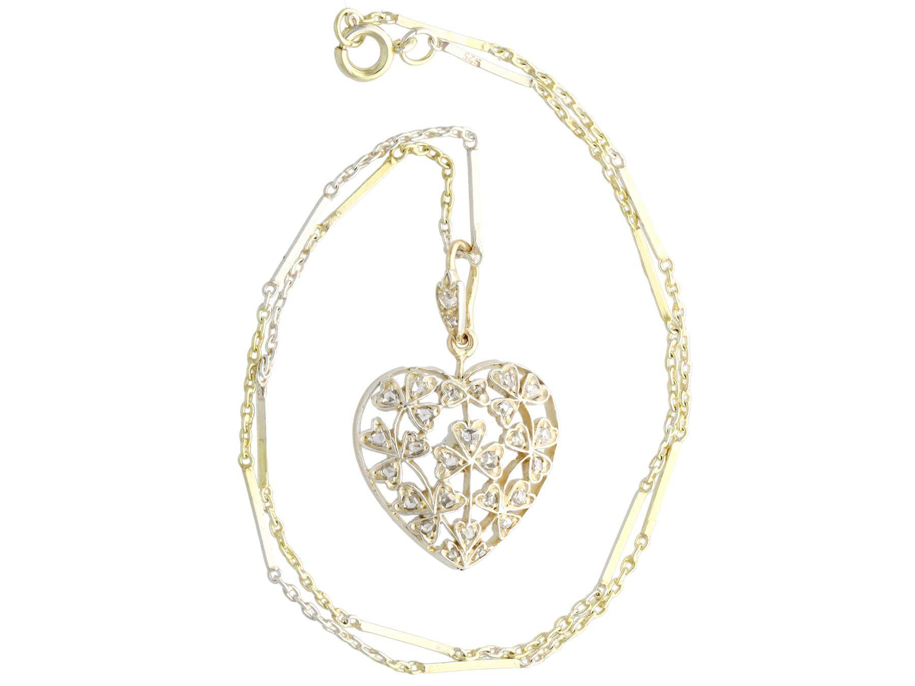 An exceptional, fine and impressive antique Victorian 0.70 carat diamond and 12 karat yellow gold, silver set heart shaped pendant; part of our diverse antique jewelry and estate jewelry collections.

This exceptional, fine and impressive diamond