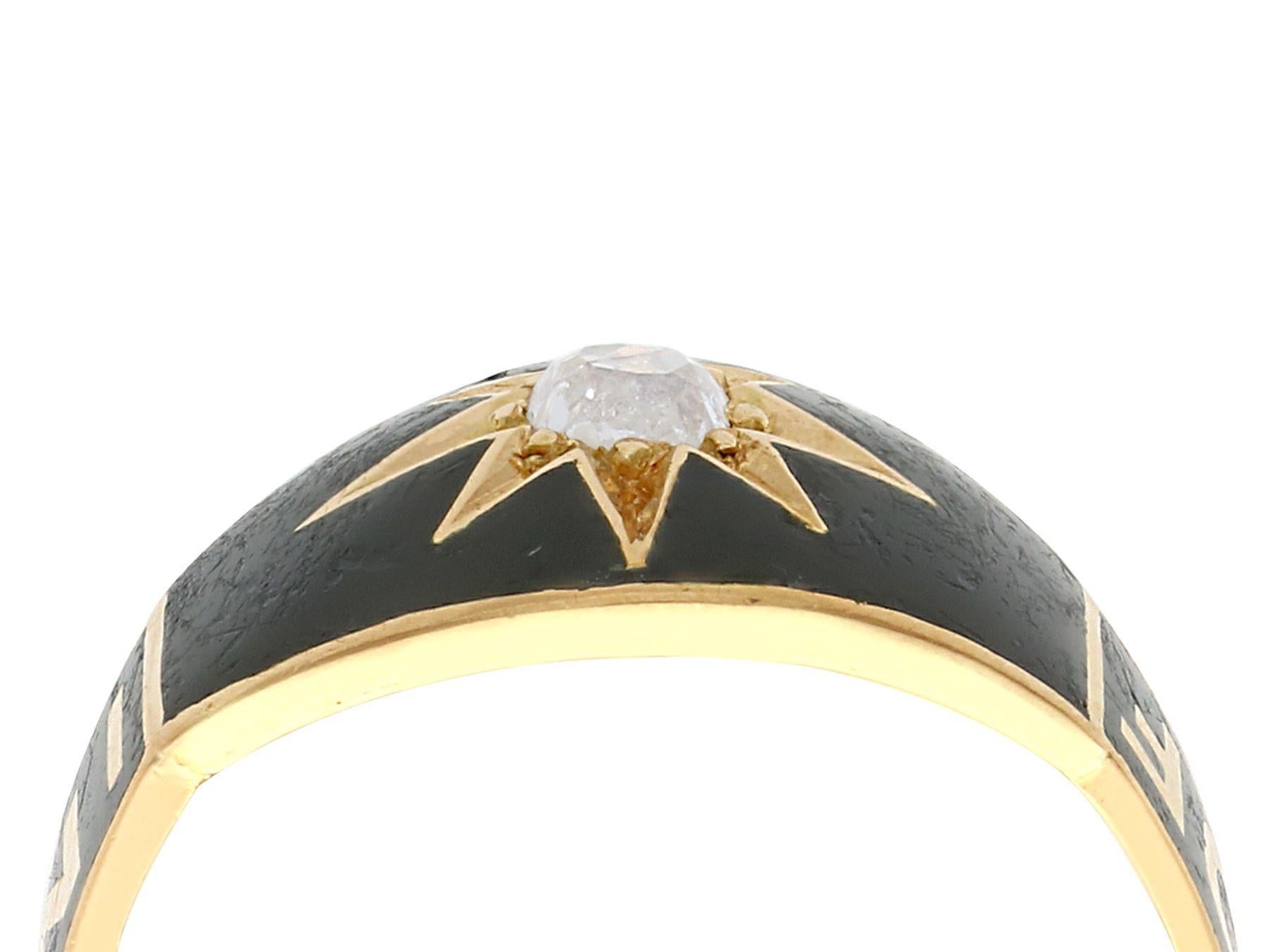 An impressive antique Victorian 0.13 carat diamond and black enamel, 18 karat yellow gold mourning ring; part of our diverse antique jewelry and estate jewelry collections.

This fine and impressive Victorian mourning ring has been crafted in 18k
