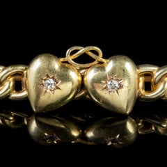 Antique Victorian Diamond Double Heart Brooch 15 Carat Gold, circa 1900