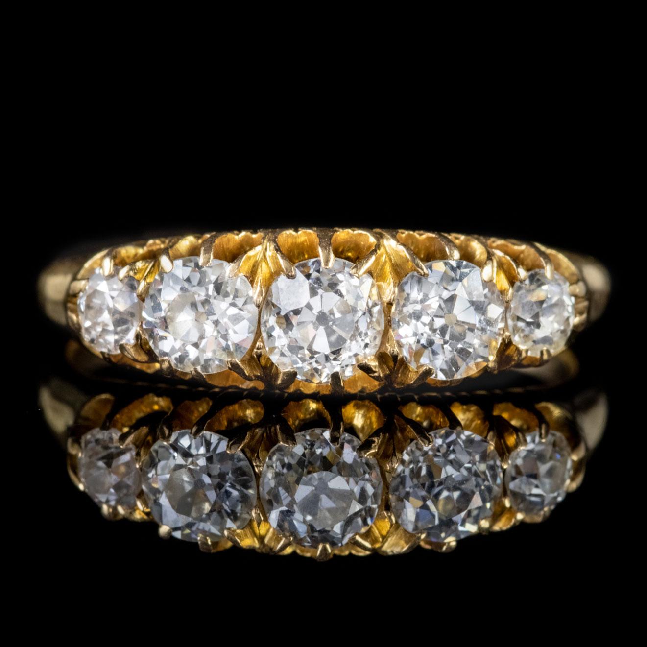 A striking Antique late-Victorian ring crafted in solid 18ct Yellow Gold and lined with five stunning claw set old European cut Diamonds which boast a clean, bright sparkle with VS1 clarity and H colour. 

Old Cut Diamonds have many facets which are