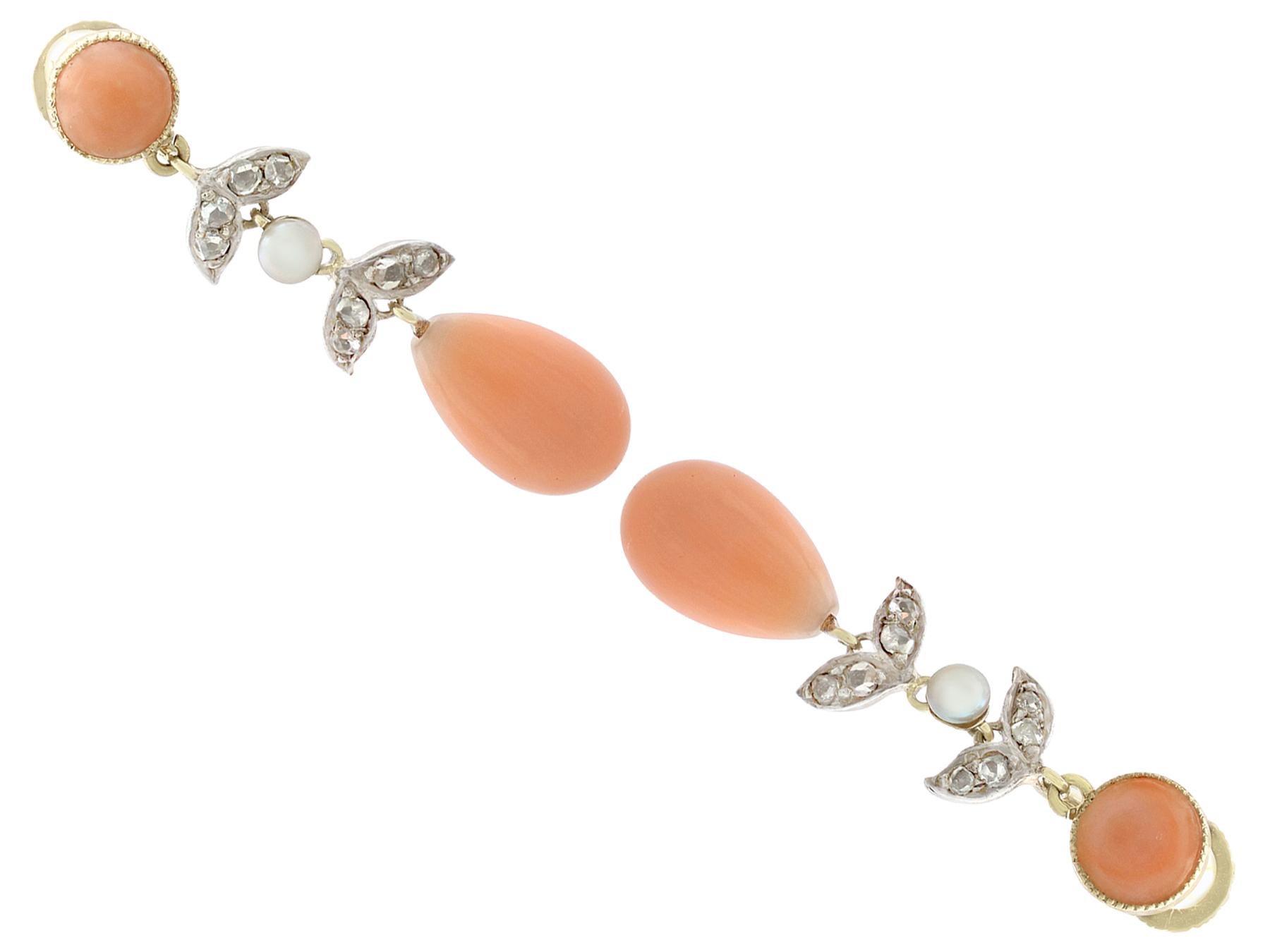A stunning pair of antique pink coral and seed pearl, 0.33 carat diamond and 15 carat yellow gold, silver set drop earrings; part of our diverse antique jewellery and estate jewelry collections.

These stunning, fine and impressive pink coral drop