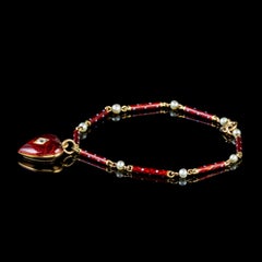 Antique Victorian Diamond Red Enamel Boxed Heart Charm Bracelet, circa 1900