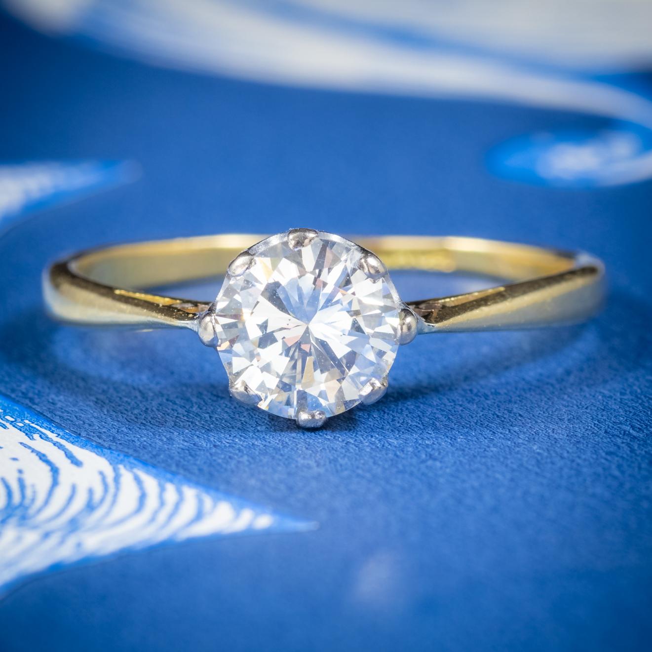 A stunning antique Victorian Solitaire ring crowned with a beautiful 0.97ct old brilliant cut Diamond which has been certified as a VS1 clarity – L colour stone and sparkles beautifully in the light.  

The solitaire is claw set in an 18ct White