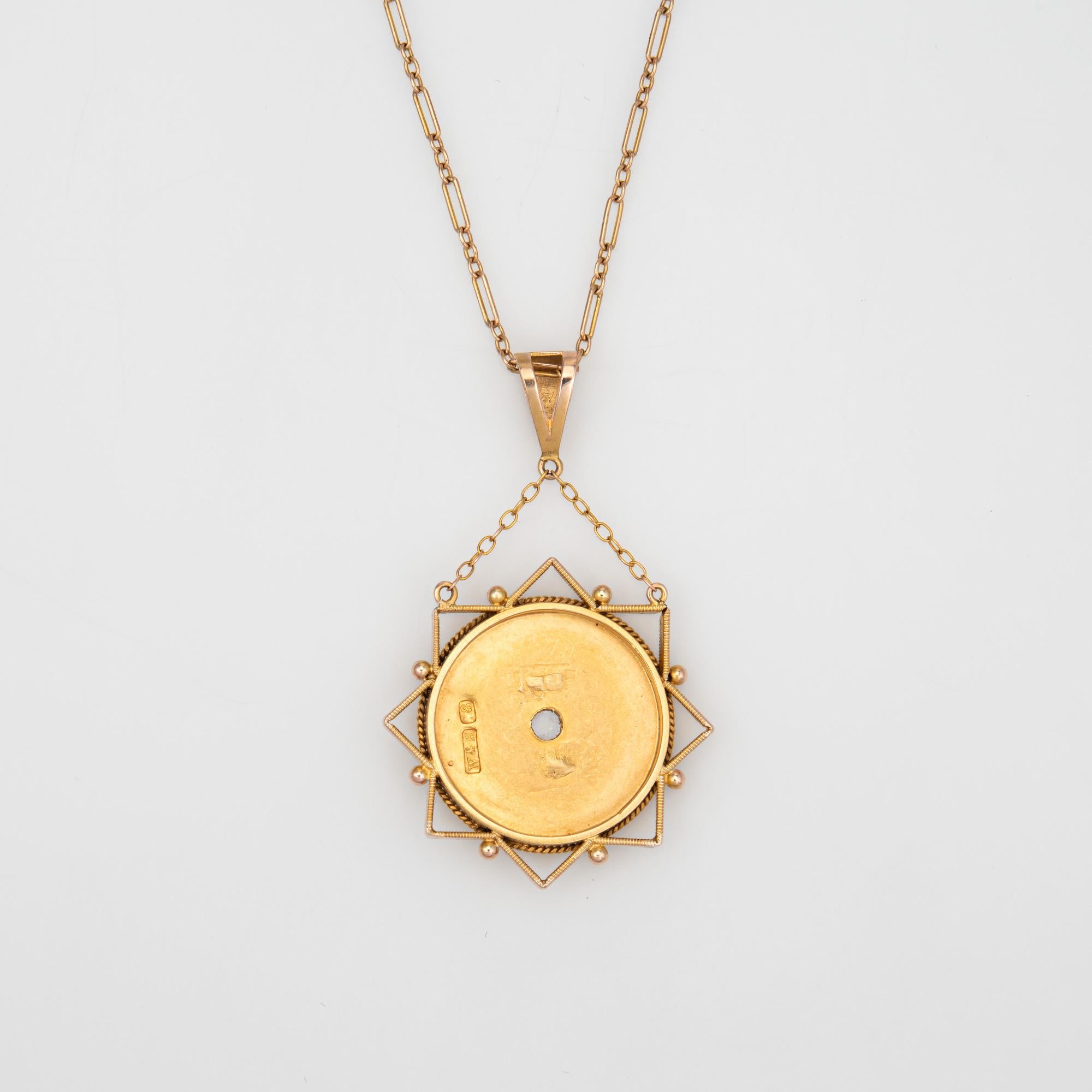 Finely detailed antique Victorian diamond star necklace (circa 1880s to 1900s), crafted in 18 karat yellow gold (pendant) and 10k yellow gold (chain). 

One estimated 0.05 carat old rose cut diamond is set to the center (estimated at J-K color and
