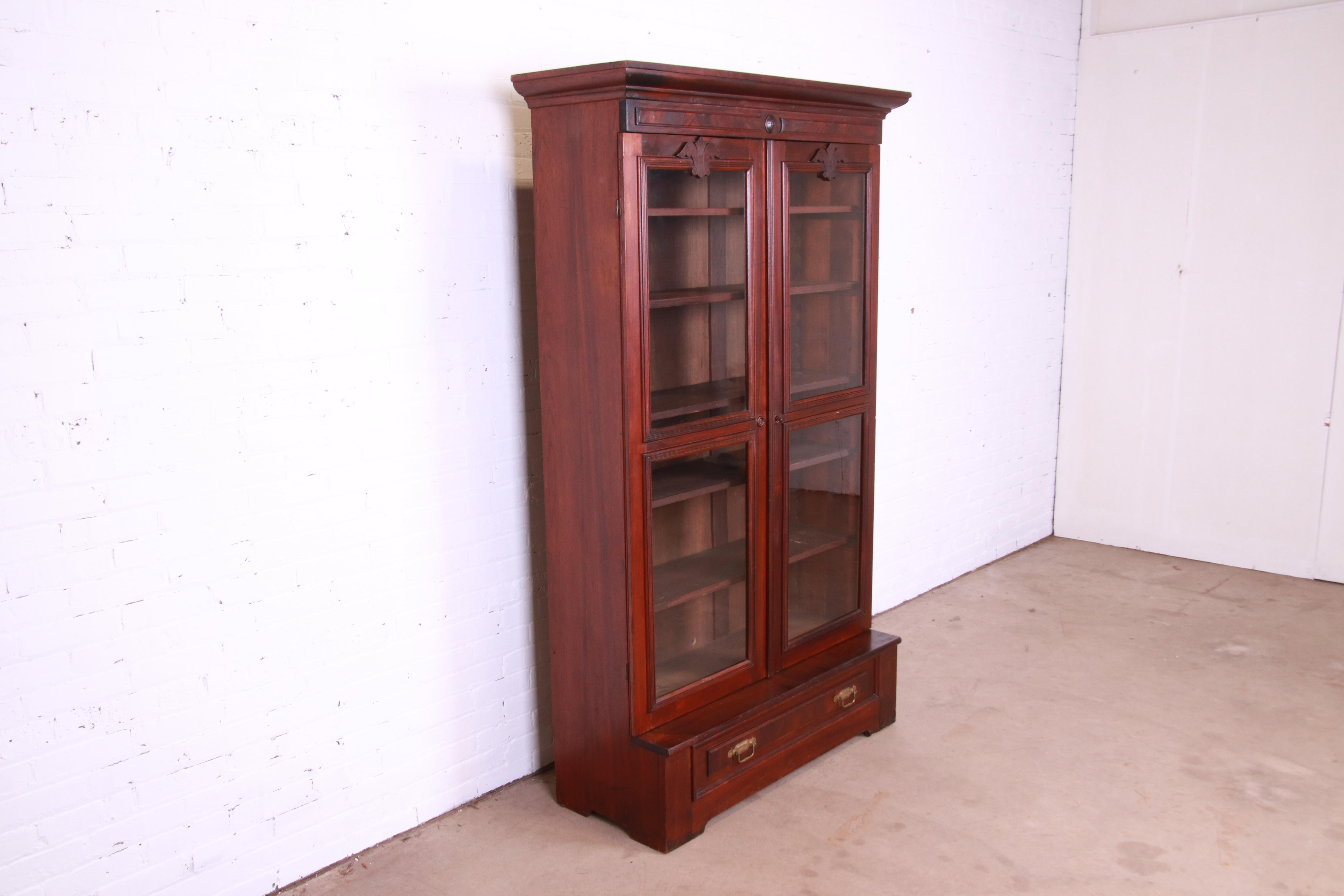 Antique Victorian Eastlake Carved Walnut and Burl Wood Bookcase, circa 1880s In Good Condition In South Bend, IN