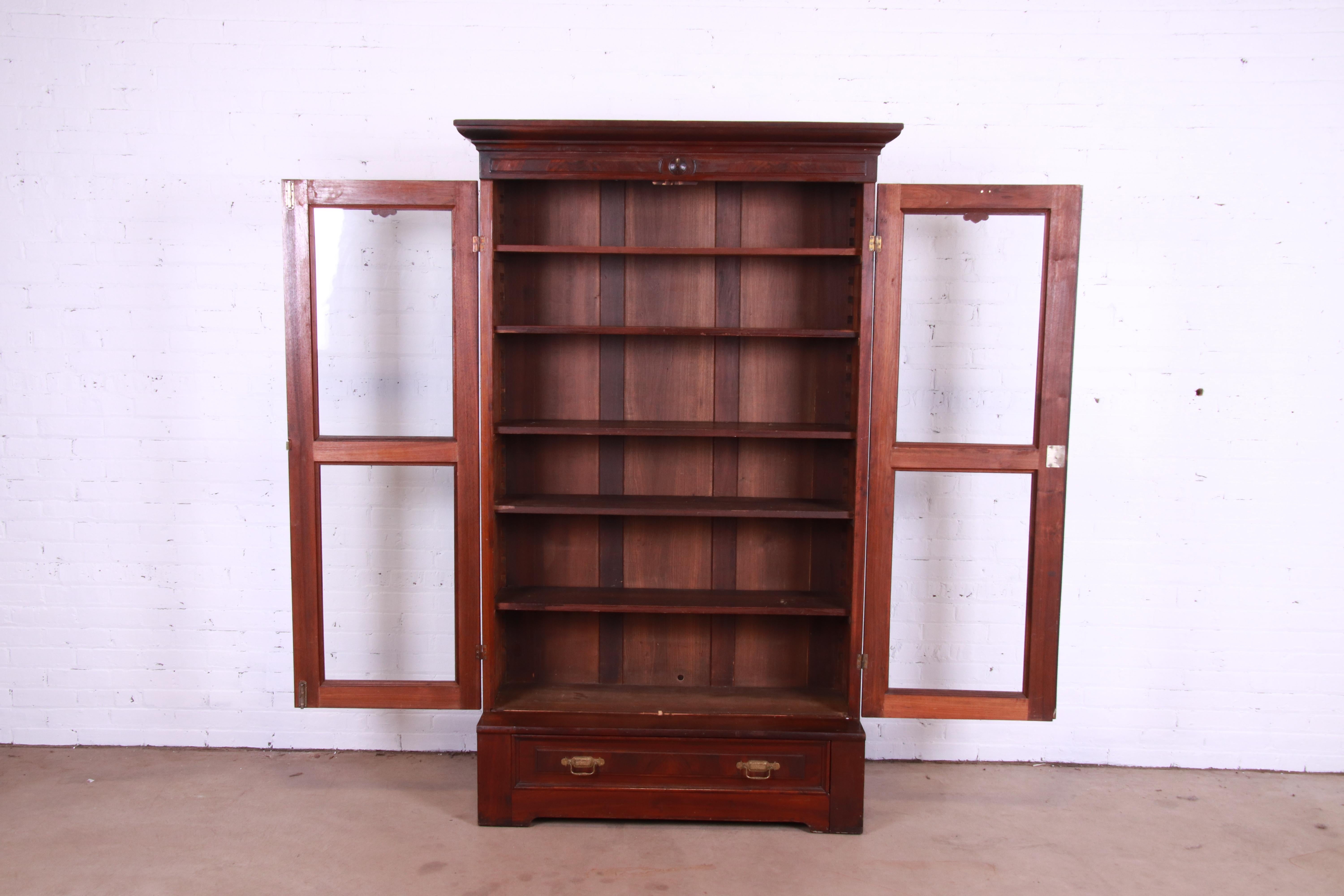 19th Century Antique Victorian Eastlake Carved Walnut and Burl Wood Bookcase, circa 1880s