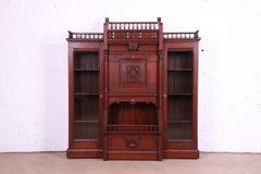 Antique Victorian Eastlake Carved Walnut Double Bookcase with Secretary Desk