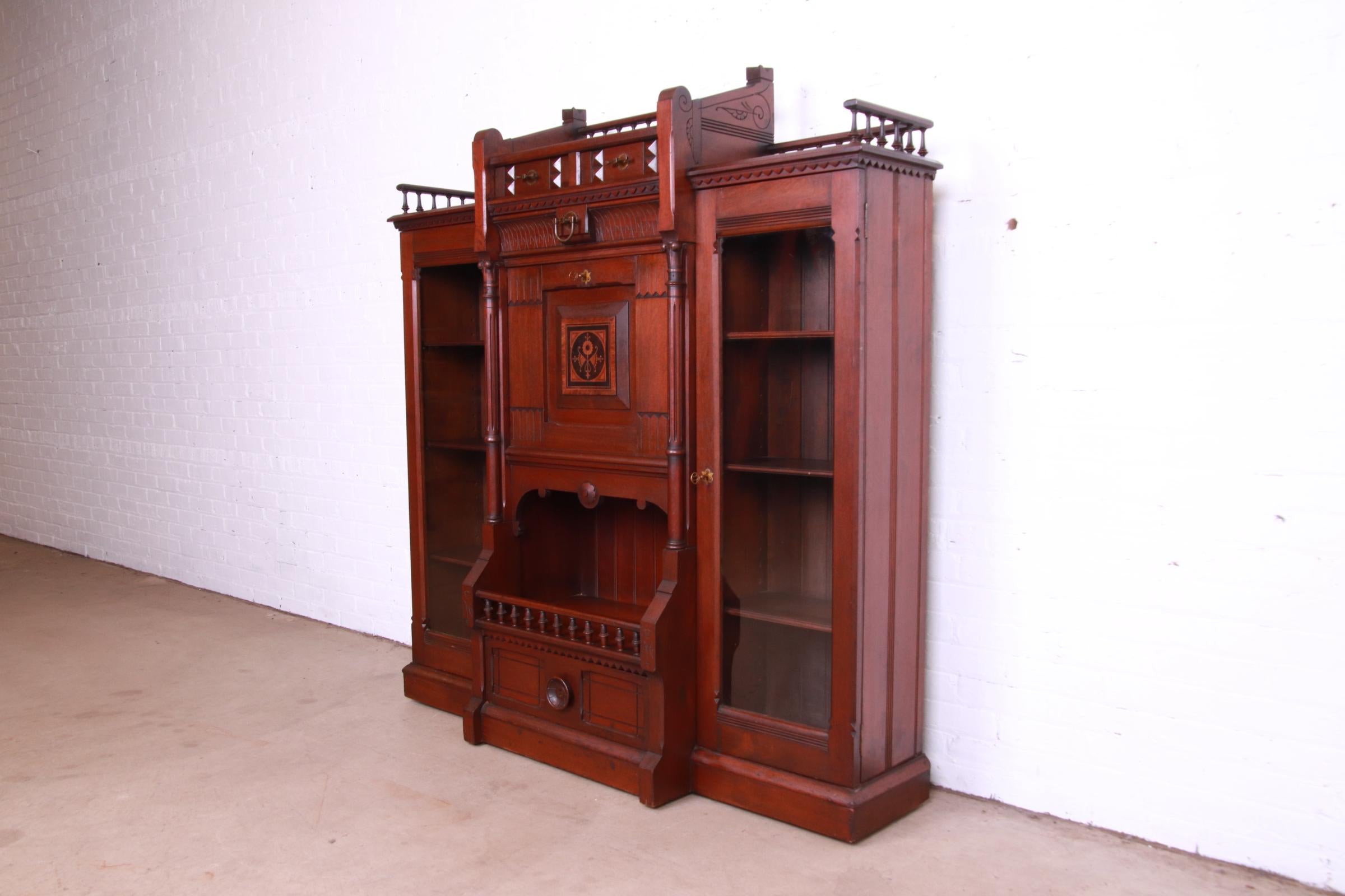 Brass Antique Victorian Eastlake Carved Walnut Double Bookcase with Secretary Desk