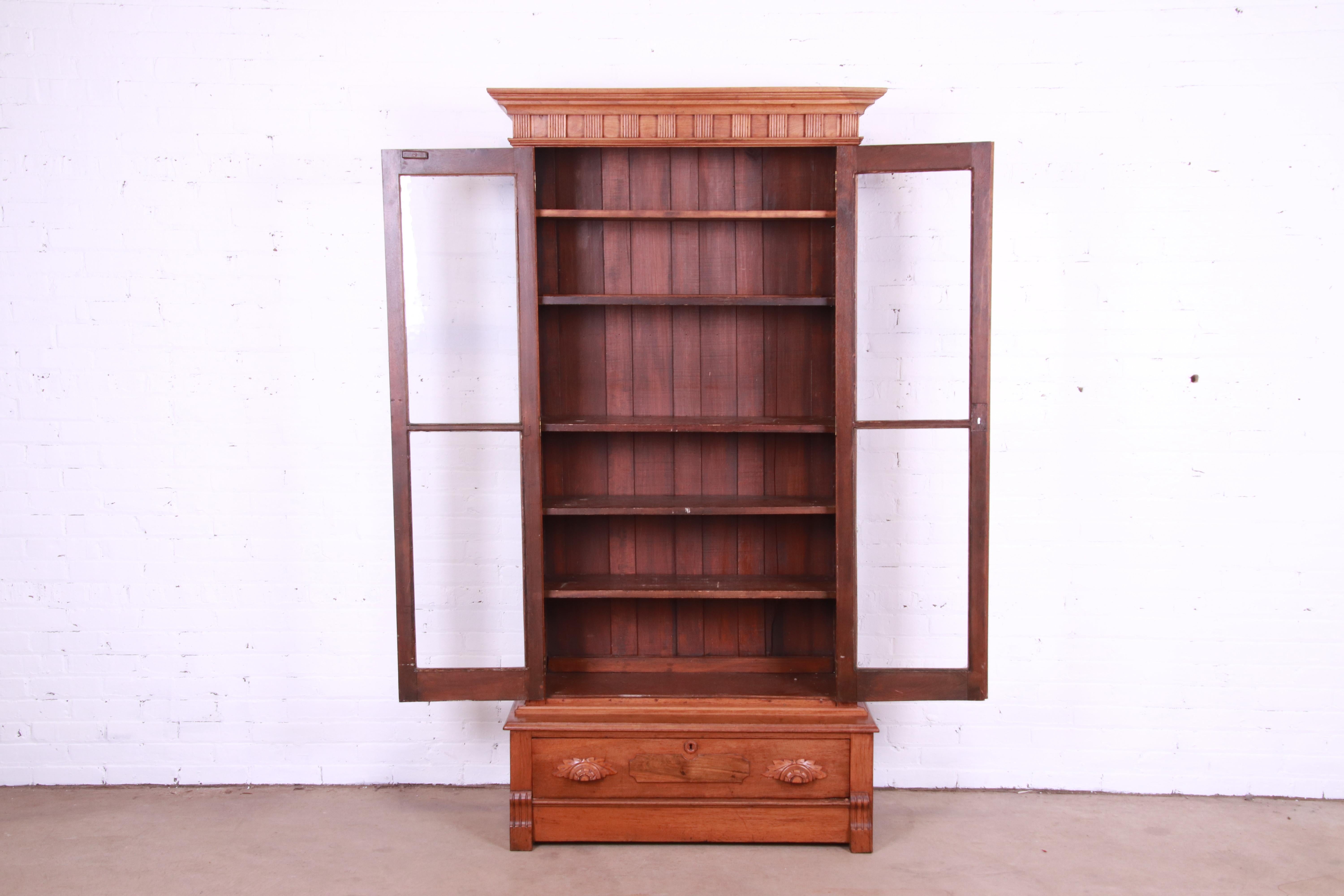 Antique Victorian Eastlake Carved Walnut Glass Front Bookcase, Circa 1880s 1