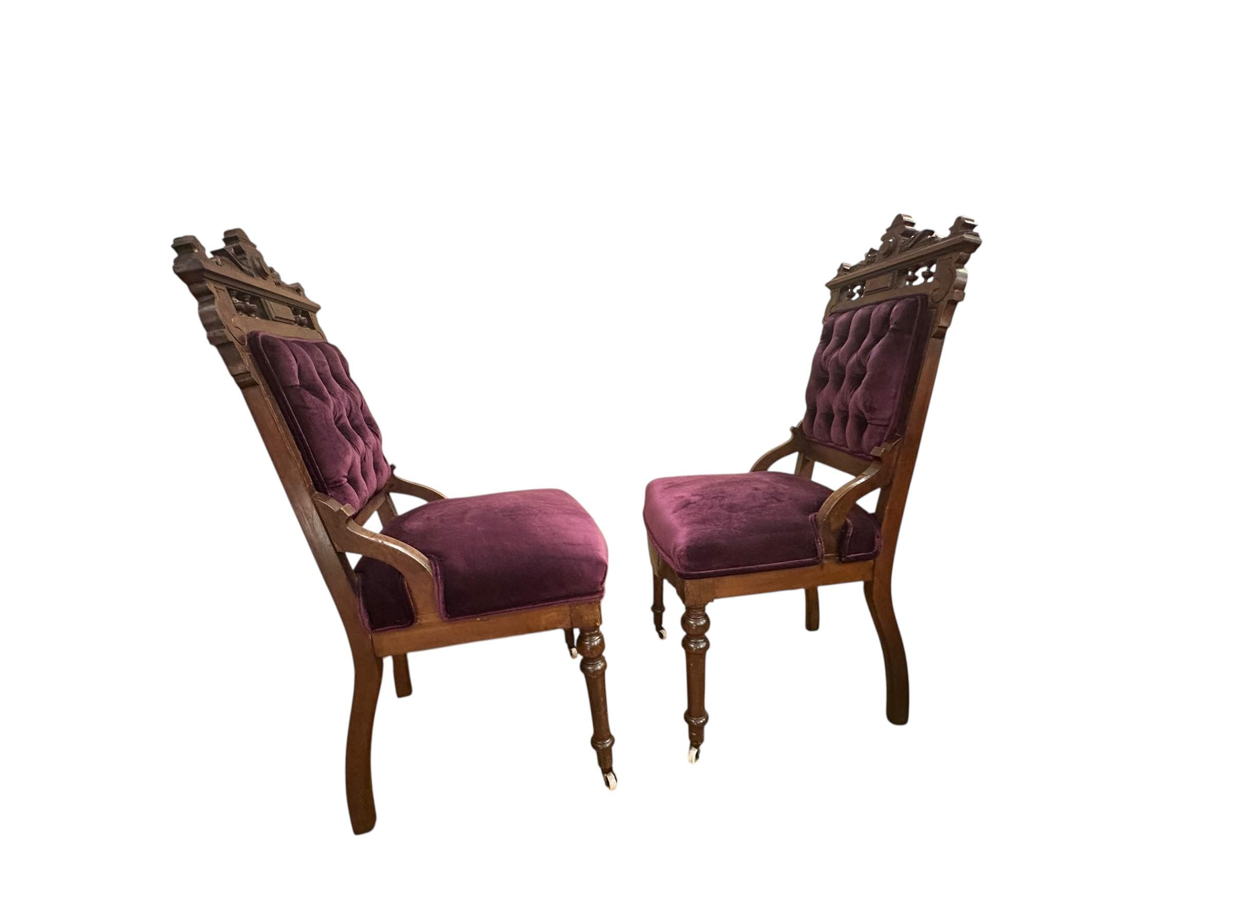 Antique 19th Century Victorian Eastlake Style 3 Piece Ornate Carved Walnut Parlor Set Newly Reupholstered in a Purple Velvet

The set comes with a settee and two side chairs. The chairs have tufted backs and the settee also have a tufted back and