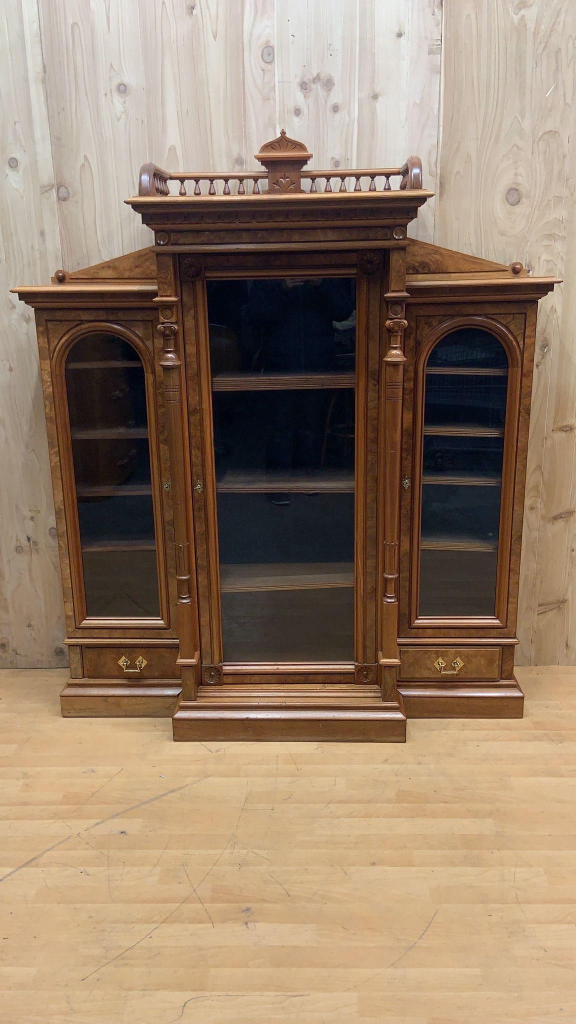 Antique Victorian Eastlake Walnut Bookcase Display Case

Gorgeous Eastlake Victorian walnut display case/bookcase is just a gorgeous piece of antique furniture. It is in extremely good condition for its age. The warm walnut wood and hand-built