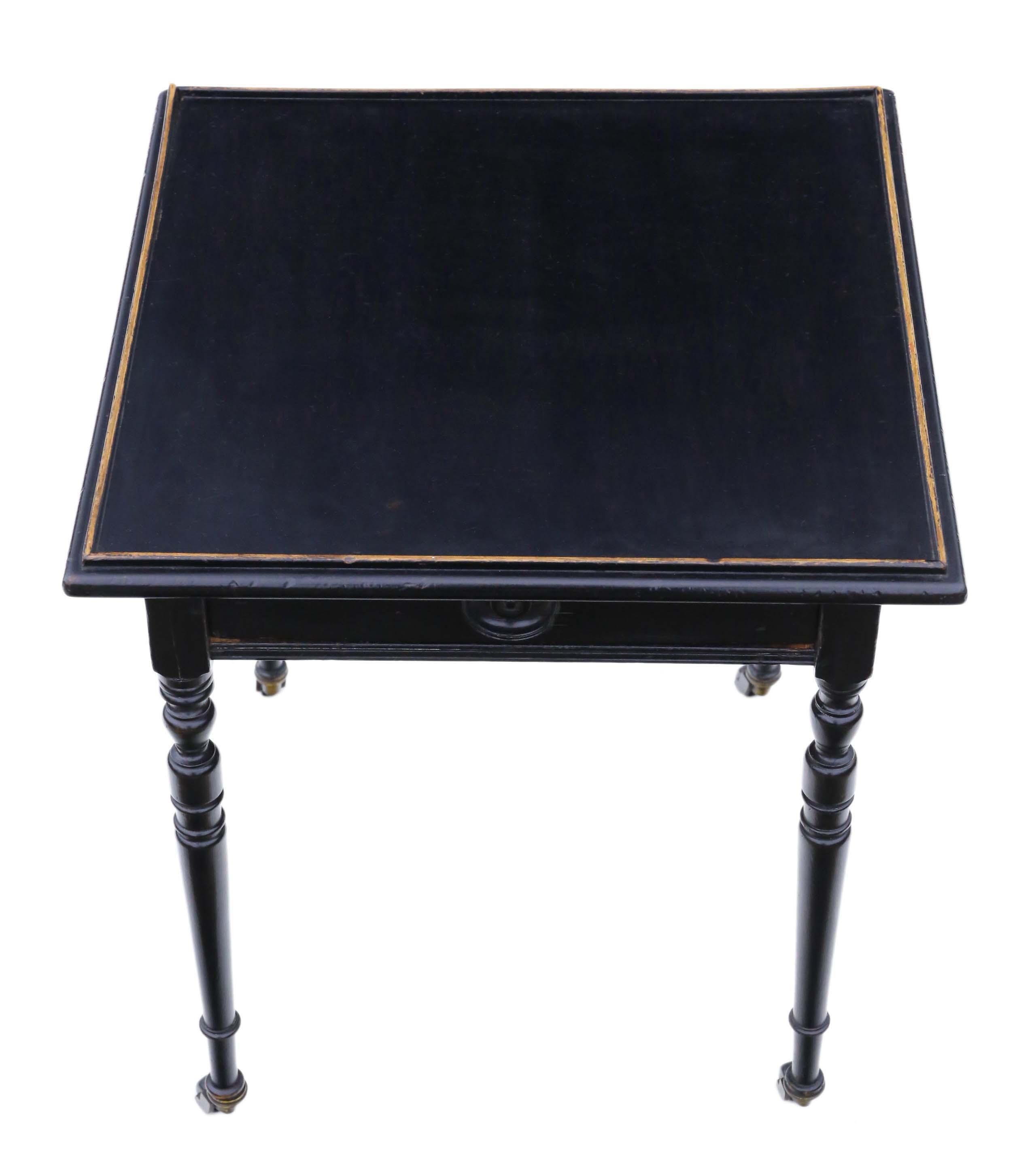 Antique Victorian C1880 ebonised and gilt side, occasional, lamp, coffee or wine table.

Stamped 'Edwards and Roberts', who are famous makers.

This is a lovely table, that is full of age, charm and character.

Rare and attractive. The