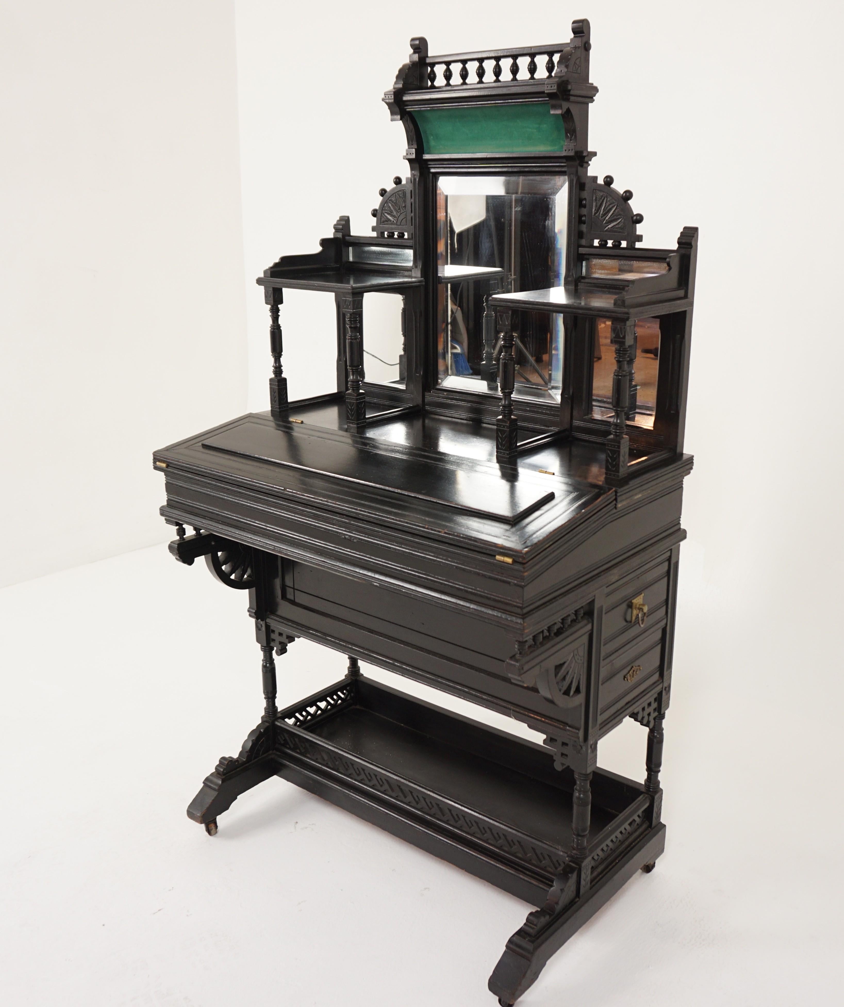 Antique Victorian Ebonized Aesthetic Davenport writing desk, Scotland 1880, B2943

Scotland 1880
Solid walnut 
Original Finish
Galleried top with rectangular beveled mirror in the centre
Flanked by a pair of shelves
With mirrors to the