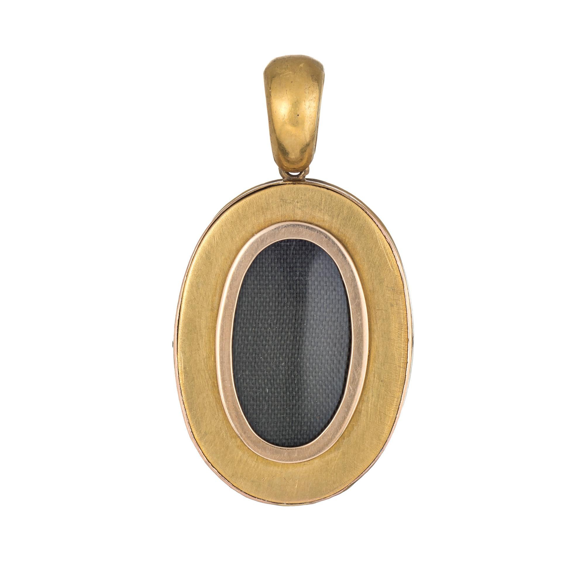 Elaborate antique Victorian pendant (circa 1860s to 1880s) crafted in 18 karat yellow gold. 

29 natural pearls each measure (average) 2mm. The pearls are in-tact and appear to be original to the pendant. 

The beautifully detailed pendant depicts