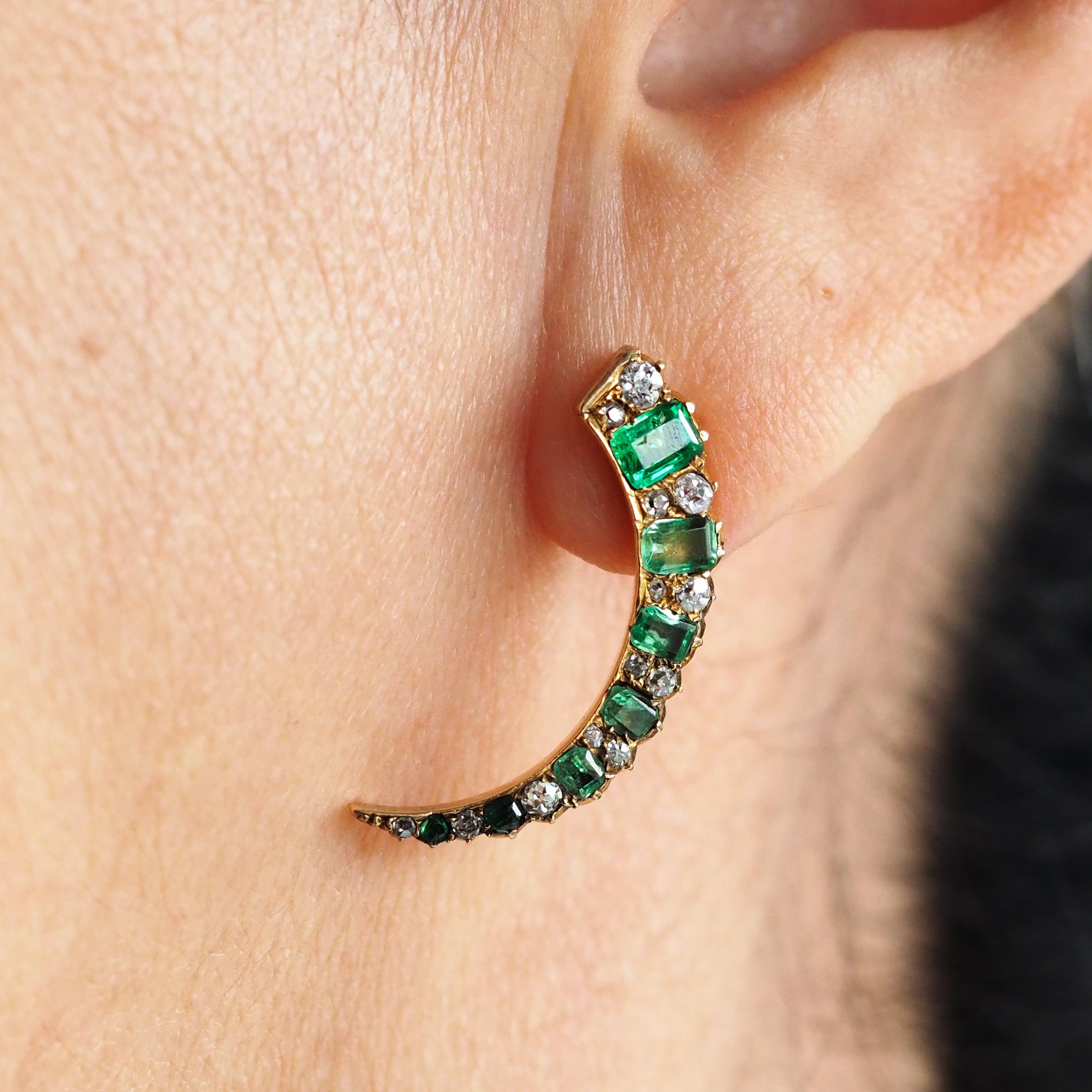 We are delighted to offer this stunning pair of antique Victorian 18ct gold emerald and diamond earrings, made c.1890.
 
Captivating upon first glance and enchanting with a celestial theme, this pair most certainly combines all the best elements of