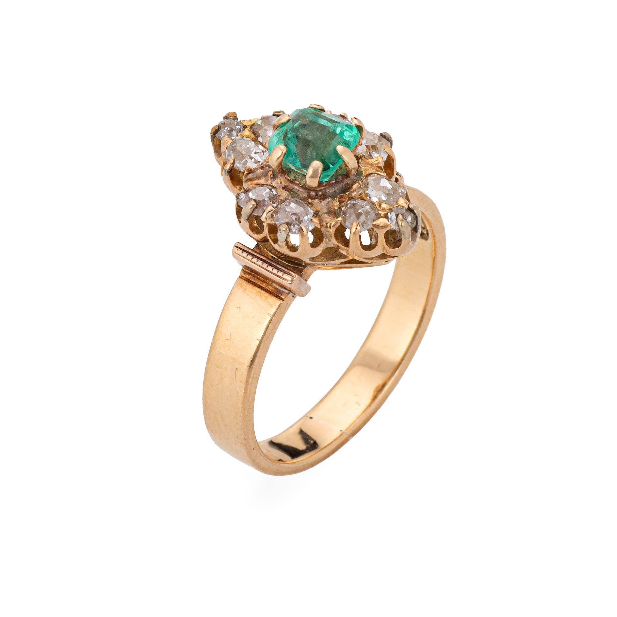 Elegant antique Victorian ring (circa 1880s to 1900s), crafted in 18 karat rose gold. 

Emerald measures 4.5mm x 4.5mm (estimated at 0.50 carats). Note: chip to the emerald and light surface abrasions. Old cushion cut diamonds range in size from