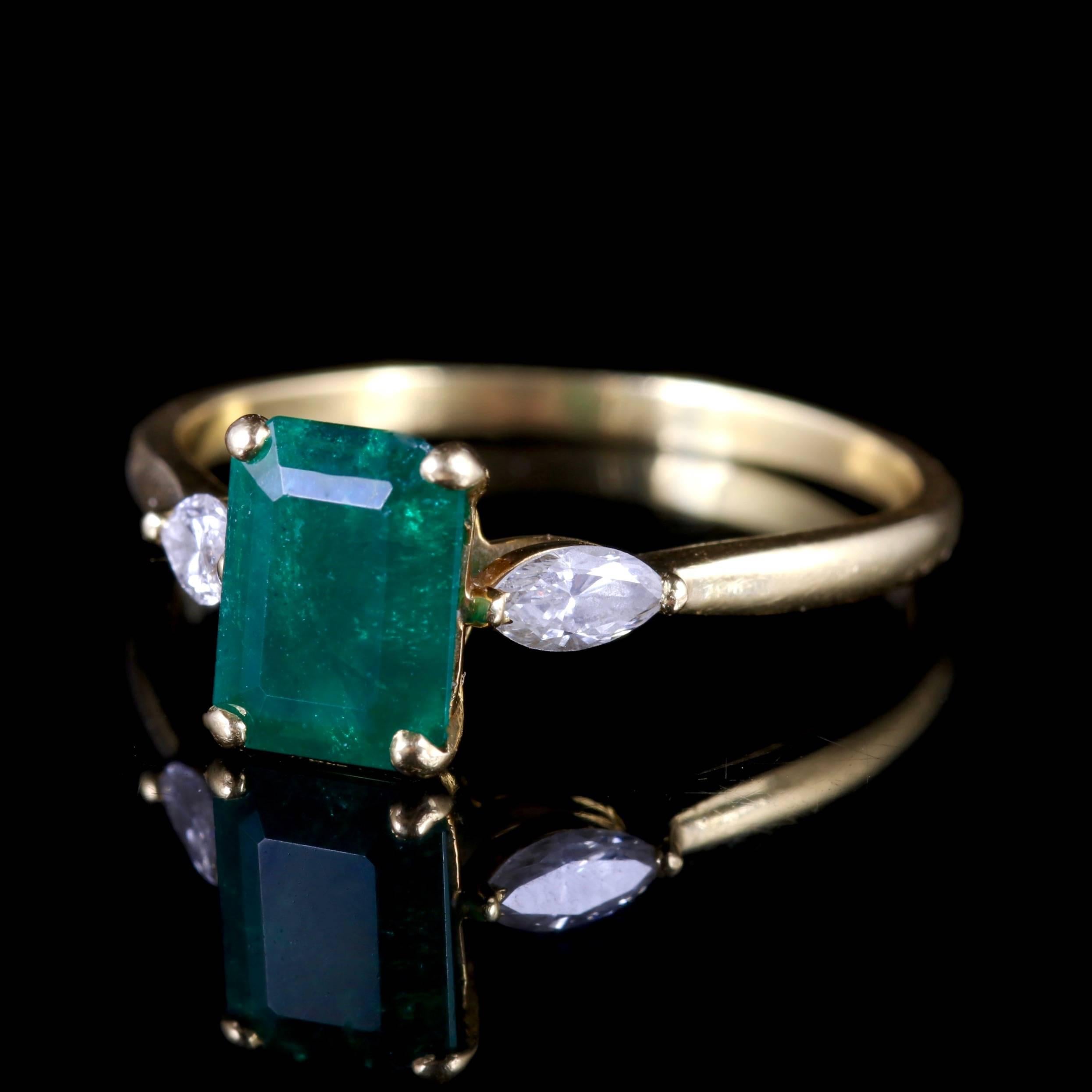 This classic 18ct Yellow Gold Victorian trilogy ring is beautiful, Circa 1900.

The ring boasts a 1.65ct Emerald in the centre, with two Marquise cut Diamonds at either side.

The Diamonds are SI1 H in colour.

Emerald derives its beautiful green