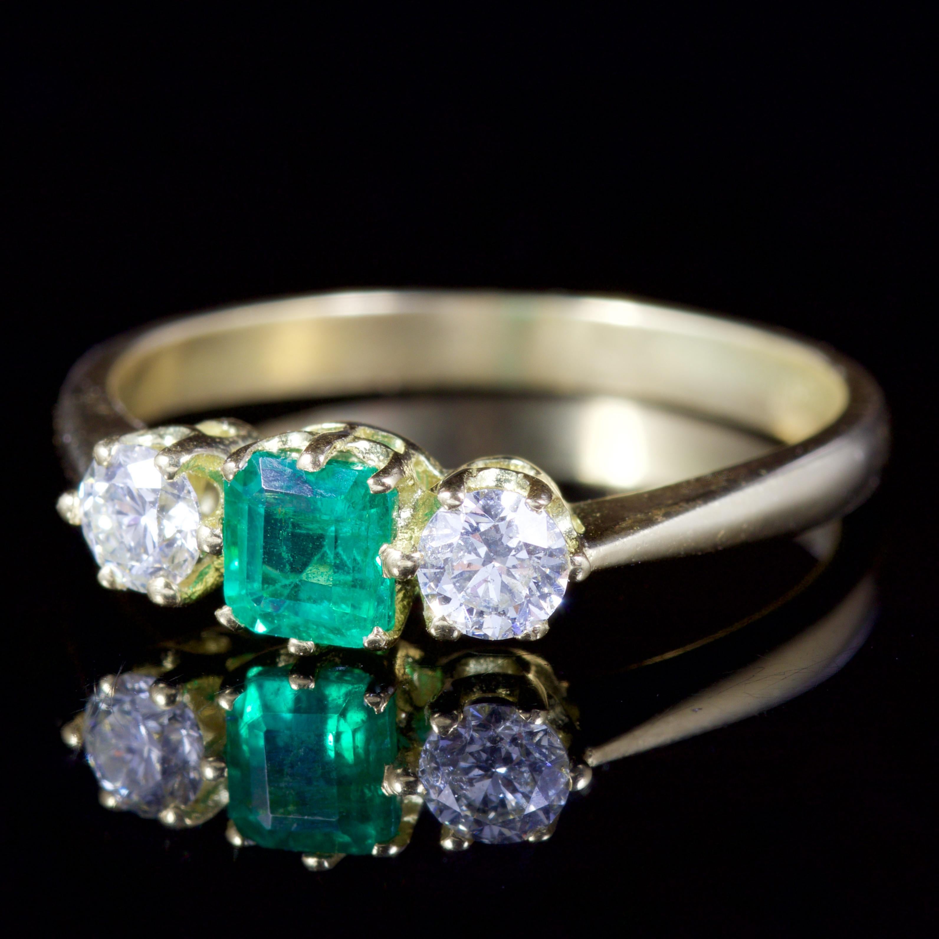 This Victorian Emerald and Diamond trilogy ring is set in 18ct Gold, Circa 1900.

The beautiful ring is adorned in a 0.35ct square cut Emerald, with 2 glistening bright white Diamonds.

The trilogy of gemstones compliment each other