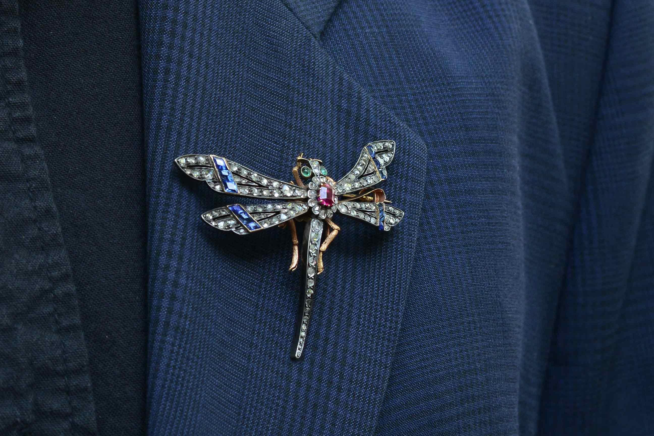 A beautiful antique insect pin, made in the late 1800s during the Victorian Era. En Tremblant, French for 