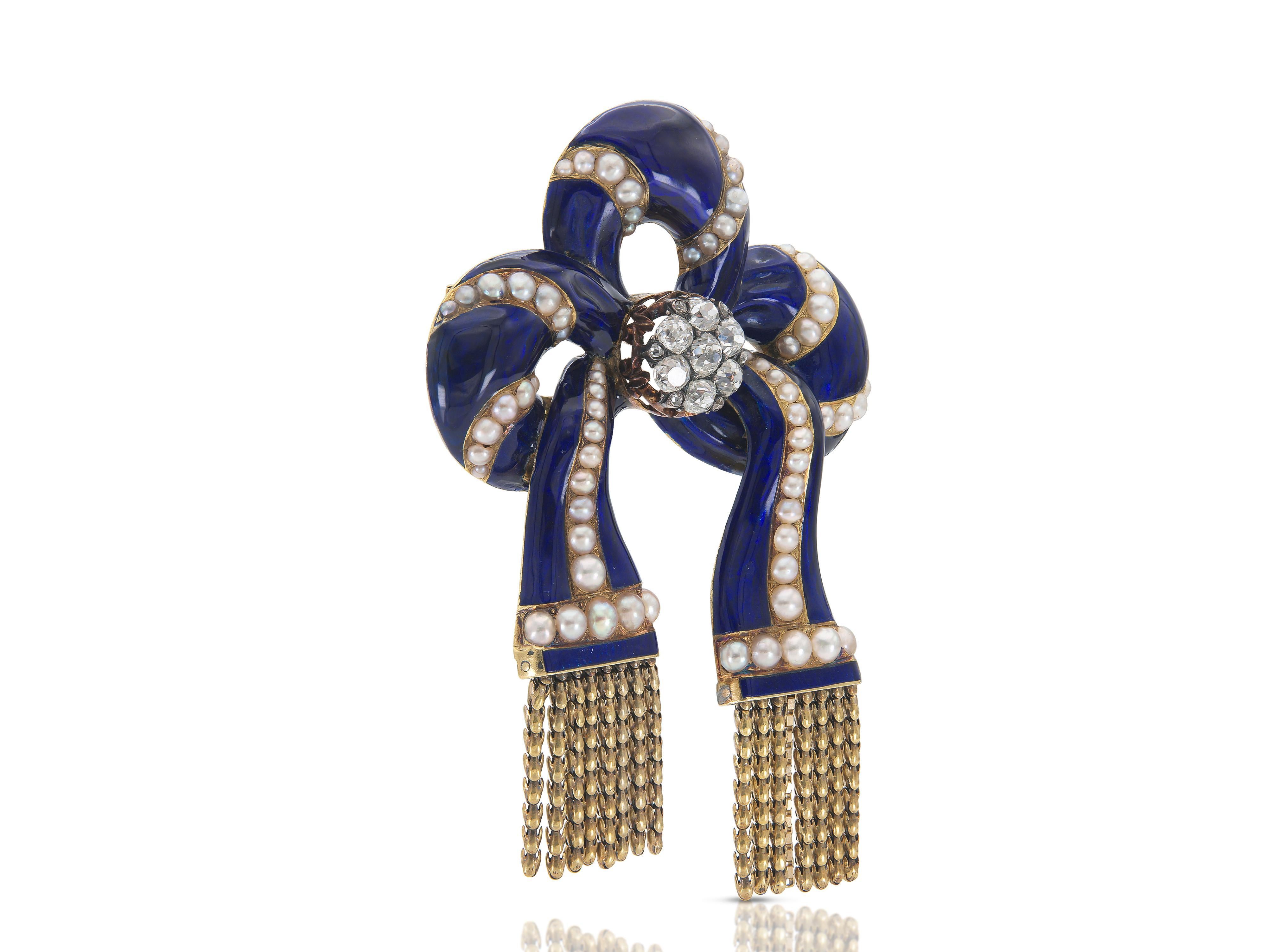 Finely crafted in 18k yellow gold, silver and blue enamel with Old Mine cut Diamonds weighing approximately a total of 2.00 carats, and Pearls.
Circa late 1800s
2 3/4 x 2 inches