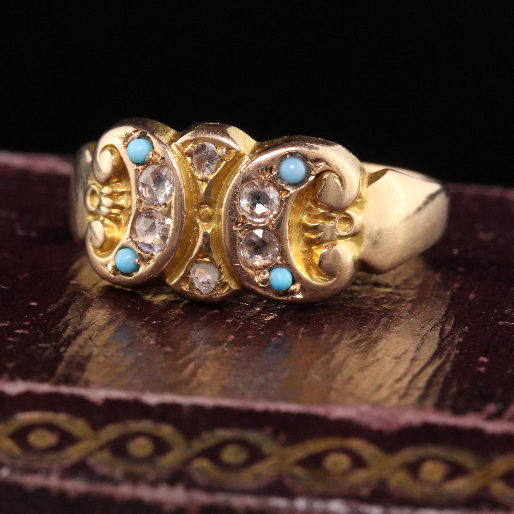 Beautiful Antique Victorian English 15K Yellow Gold Rose Cut Diamond and Turquoise Ring. This beautiful ring is crafted in 15K yellow gold. The ring has rose cut diamonds and turquoise set on top of the ring and has hallmarks inside the band.

Item