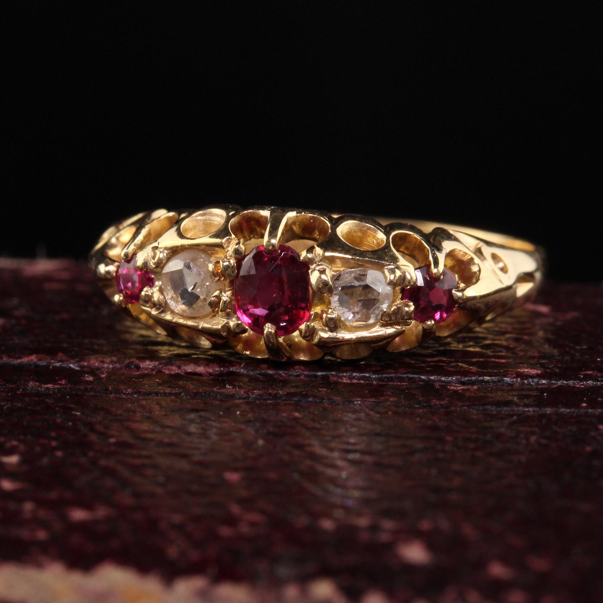 Beautiful Antique Victorian English 18K Yellow Gold Rose Cut Diamond and Ruby Ring. This beautiful ring is crafted in 18k yellow gold and has hallmarks inside the band. The top of the ring has rose cut diamonds and rubies and is in great
