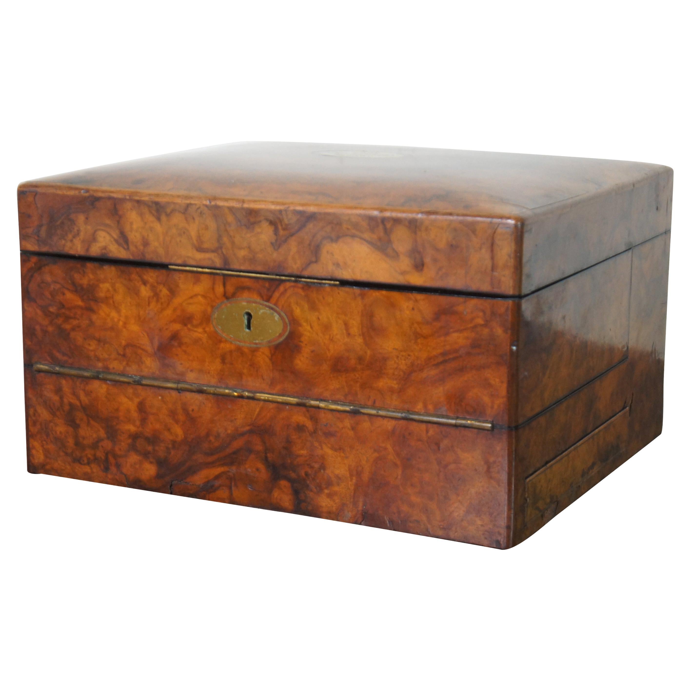 Antique mid-19th century English walnut burl wood vanity box, originally owned by Charles B. Hornby, employee of Spencer & Craig Printing Works of Cincinnati, OH. Engraved plaque on top reads “From His Brother Edward.” The interior feathers a