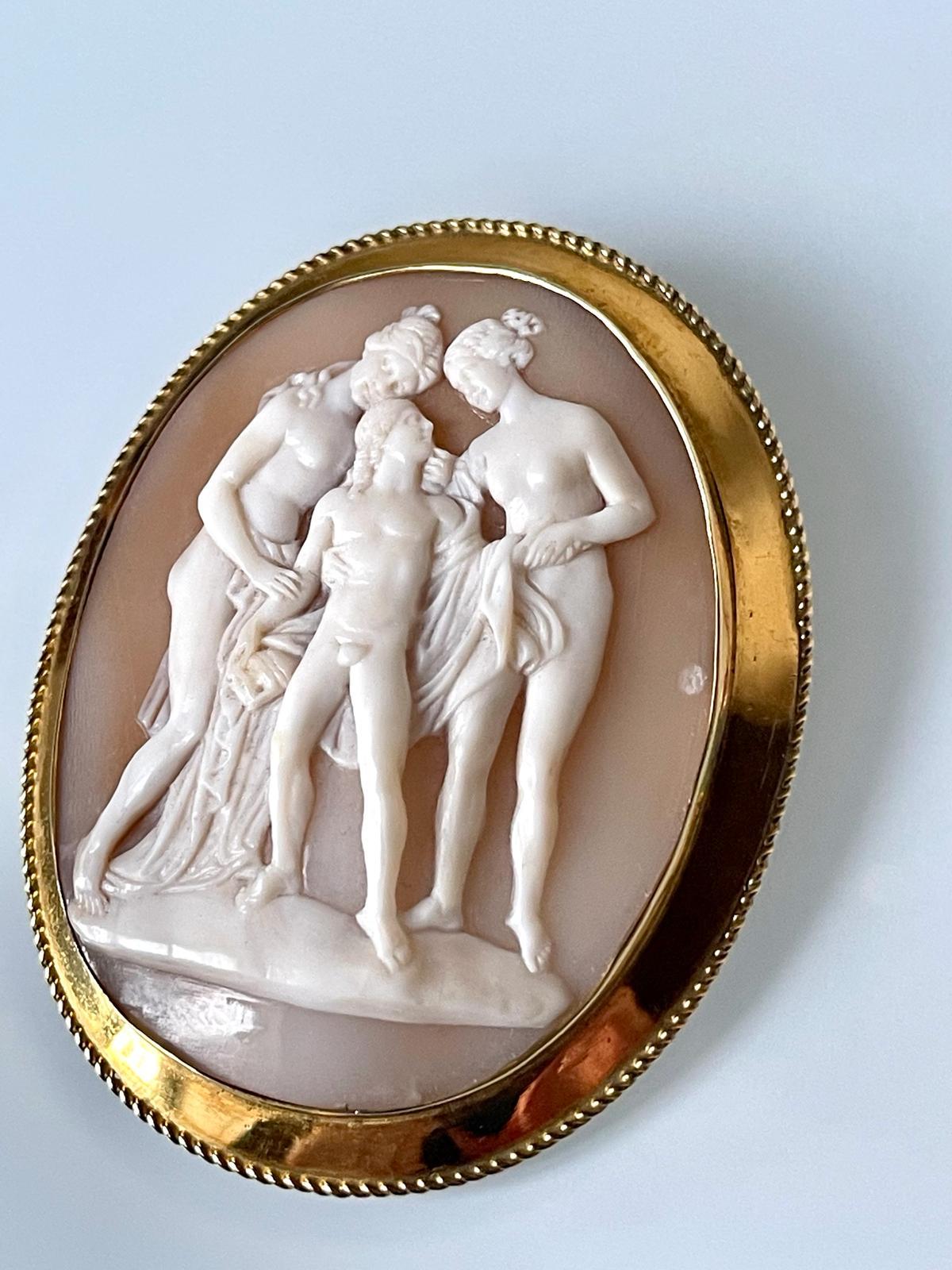 A fine English shell cameo from C 1860 depicting an erotic seduction scene (the naked female figures are, possibly, Aphrodite and Eros, known for their erotic beauty and sexuality, and both had relationships with mortal lovers). Skillfully carved,