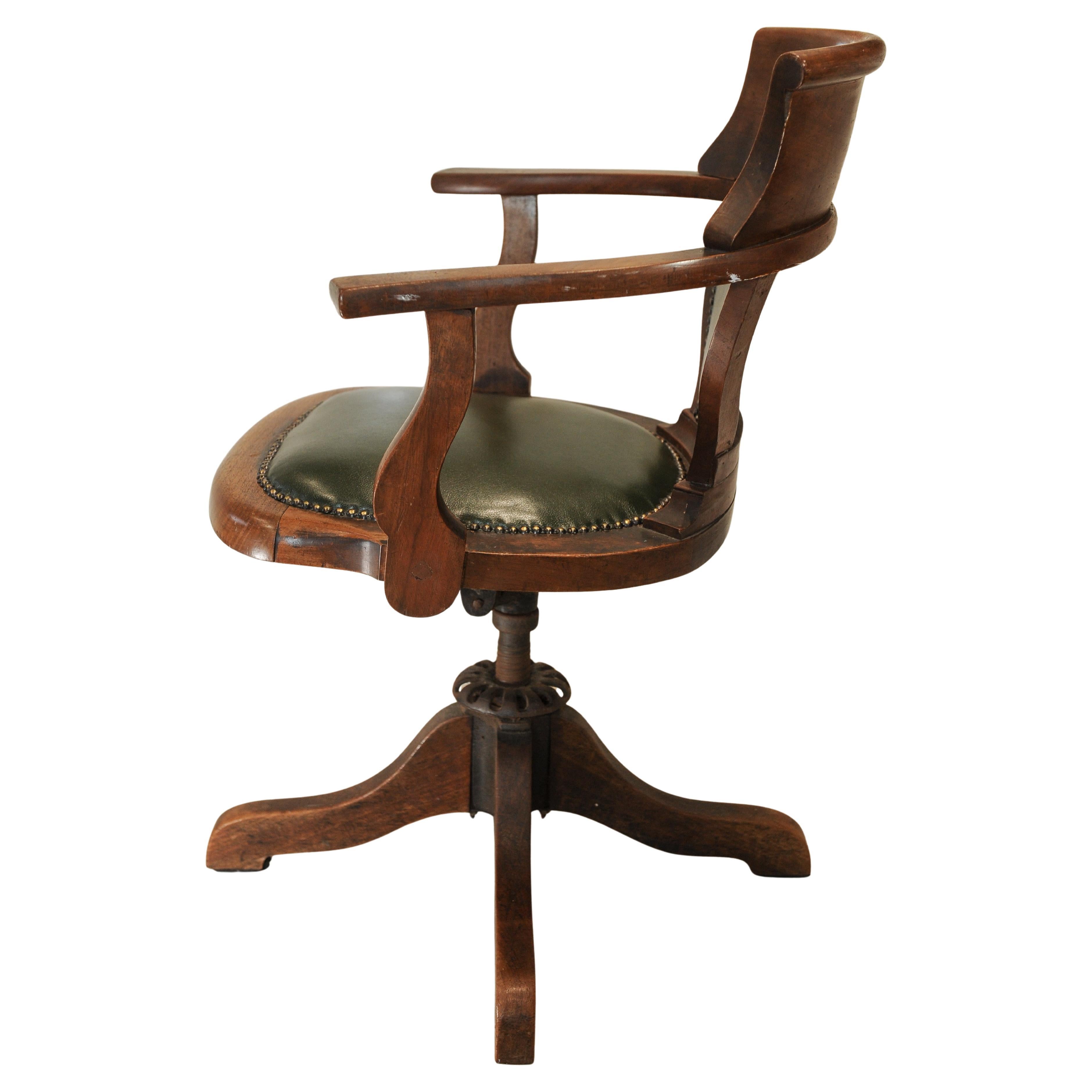 Silla de escritorio giratoria antigua victoriana inglesa de cuero verde y roble Victoriano tardío en venta