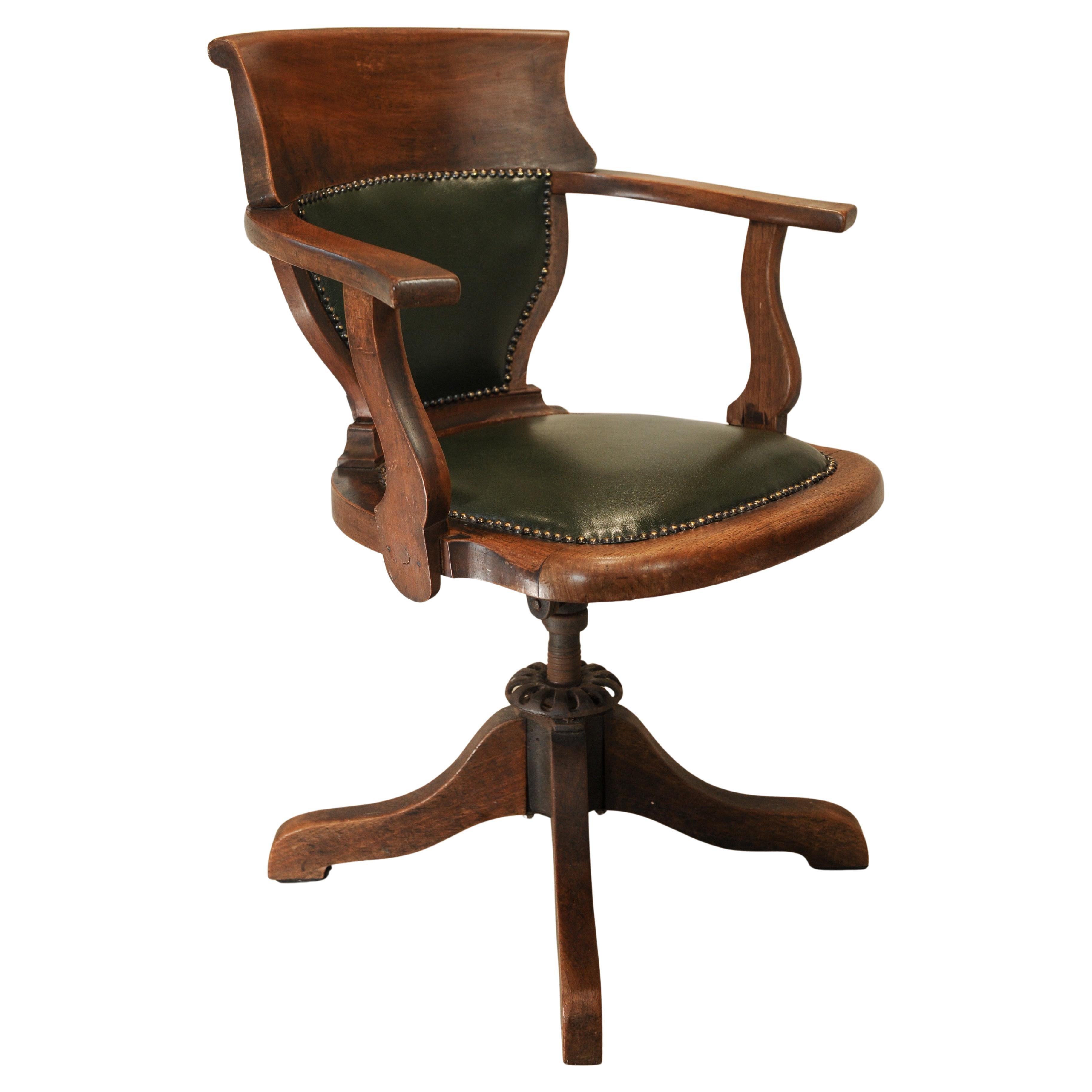 Silla de escritorio giratoria antigua victoriana inglesa de cuero verde y roble en venta 1